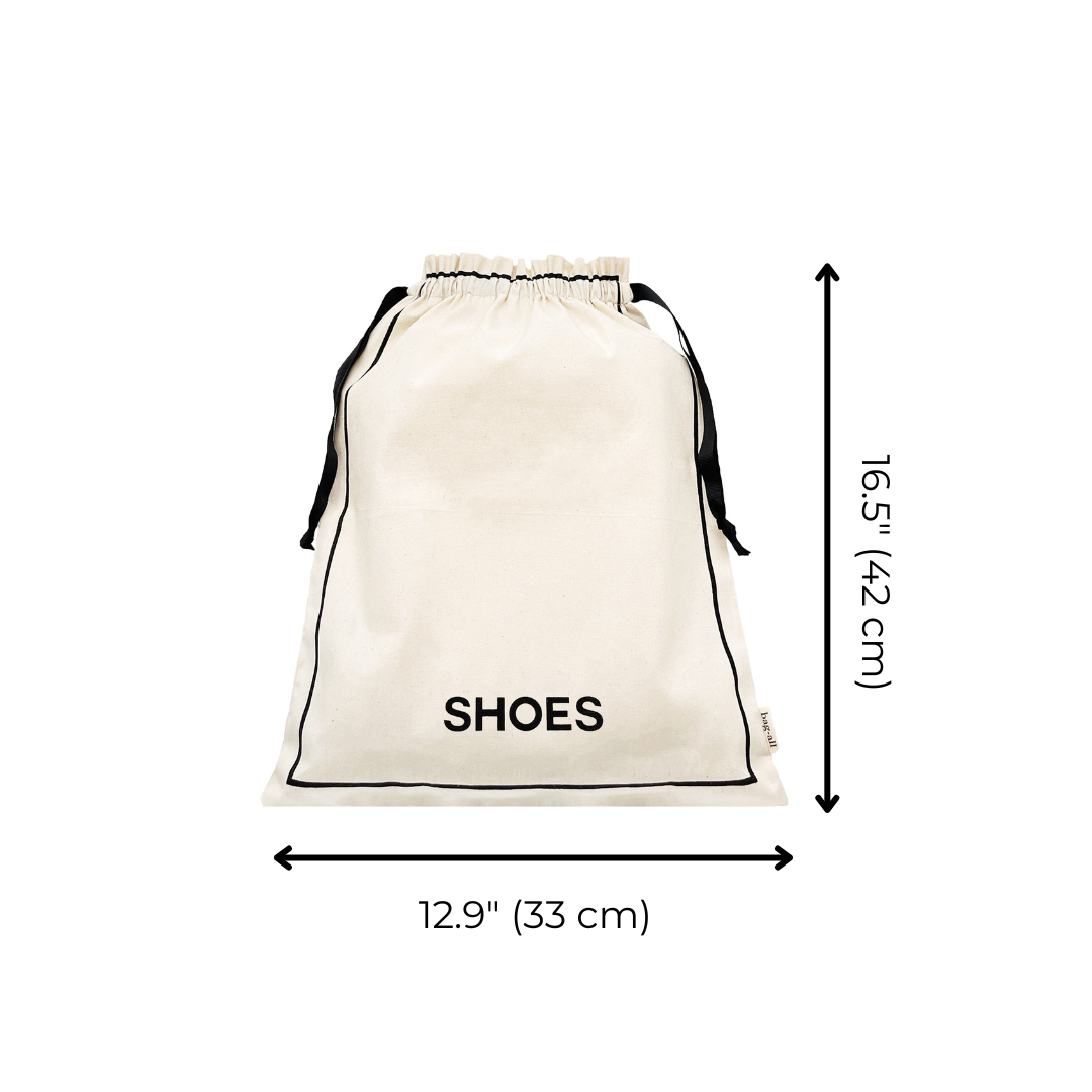Bag-all Couture Shoe Travel Bag in cream cotton with black text and measurements. Drawstring closure, 16.5 inches tall, 12.9 inches wide, eco-friendly print, perfect for shoe storage and travel.