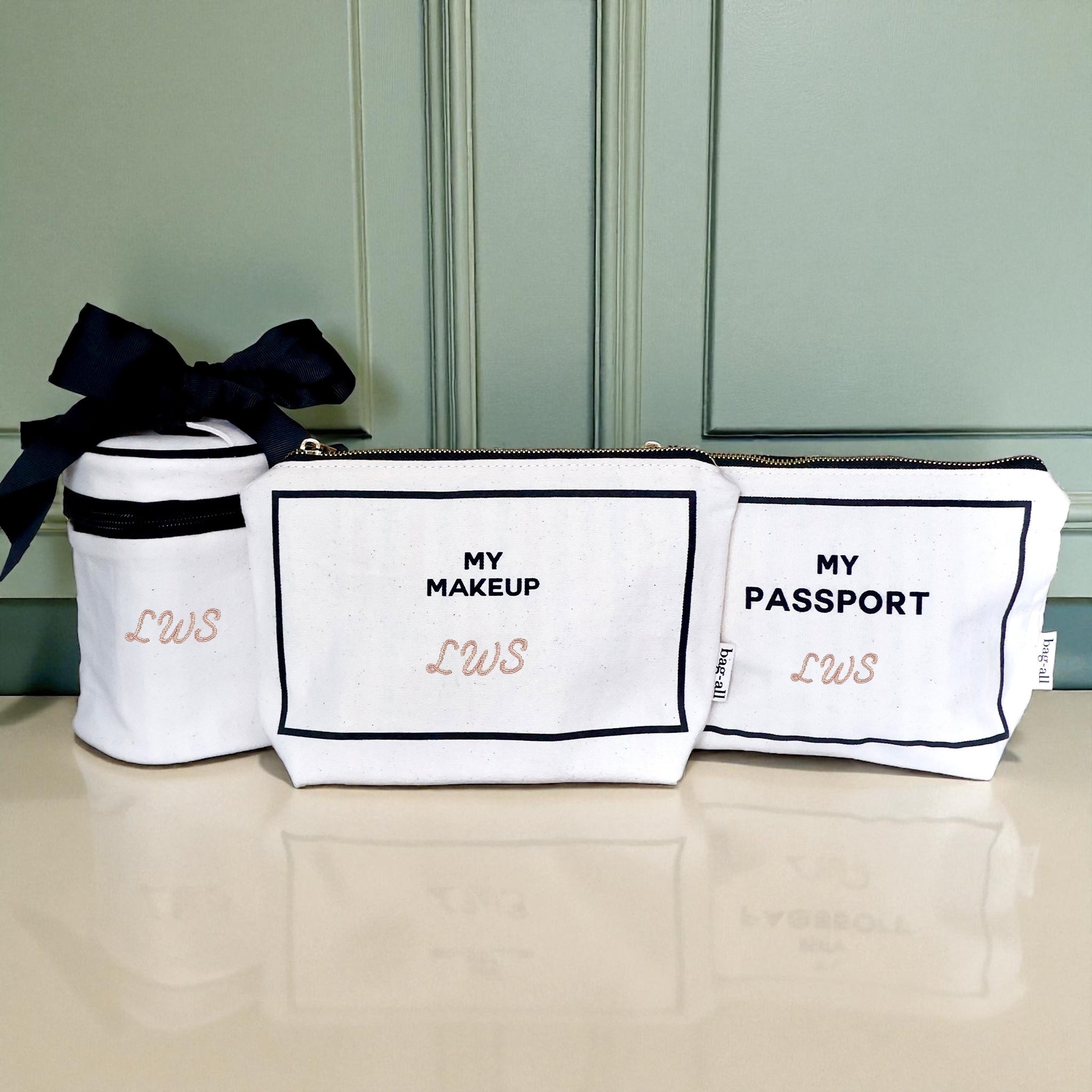 Bag-all cream travel organizers set including passport, liquid, and makeup pouches for stylish carry on essentials organization