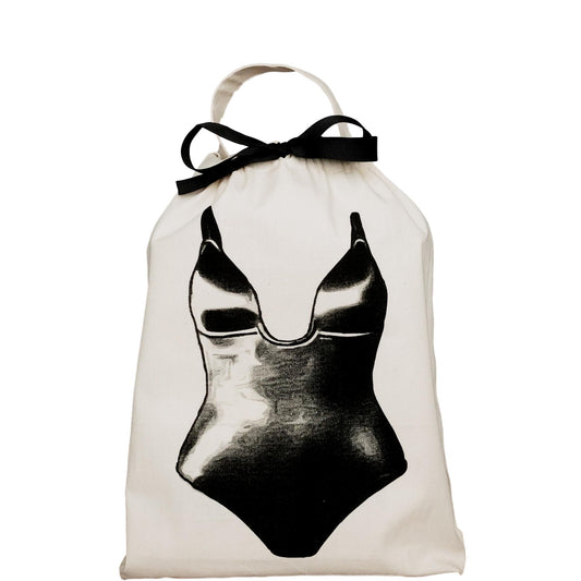 Bag-all Shapewear Travel Bag in cream with black swimsuit design and bow detail - stylish storage solution for organizing shapewear at home or while traveling