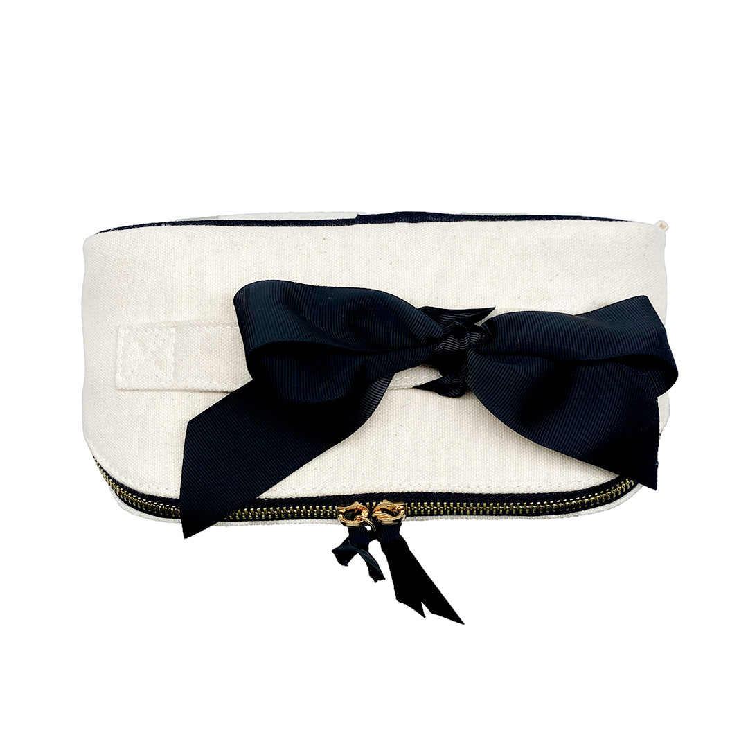 Bag-all Cotton Jewelry Case with elegant navy bow detail - white canvas storage pouch with brass zipper for travel accessories and organization