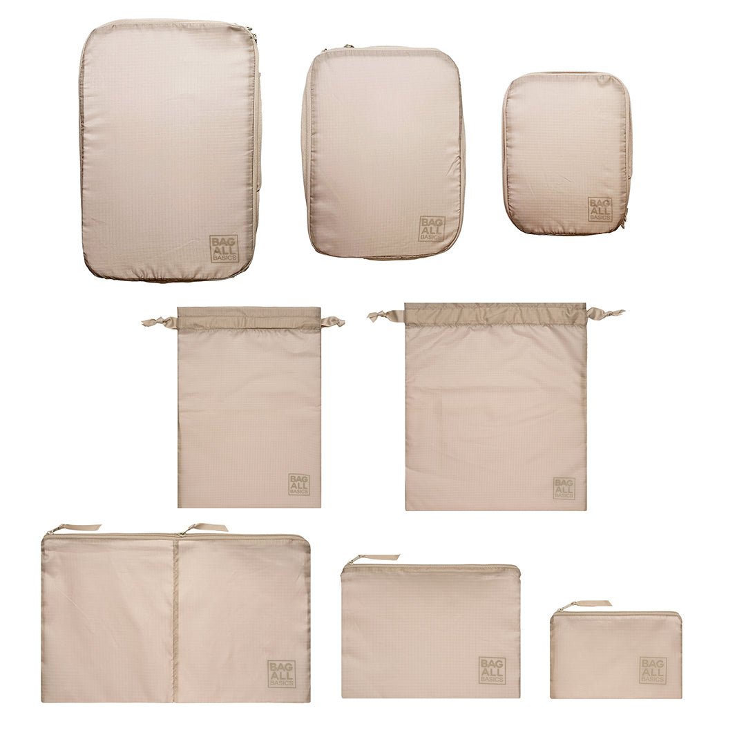 Bag-all Compression Cubes & Packing Bags Set in taupe - 8 eco-friendly travel organizers in various sizes made from recycled nylon for efficient packing and storage
