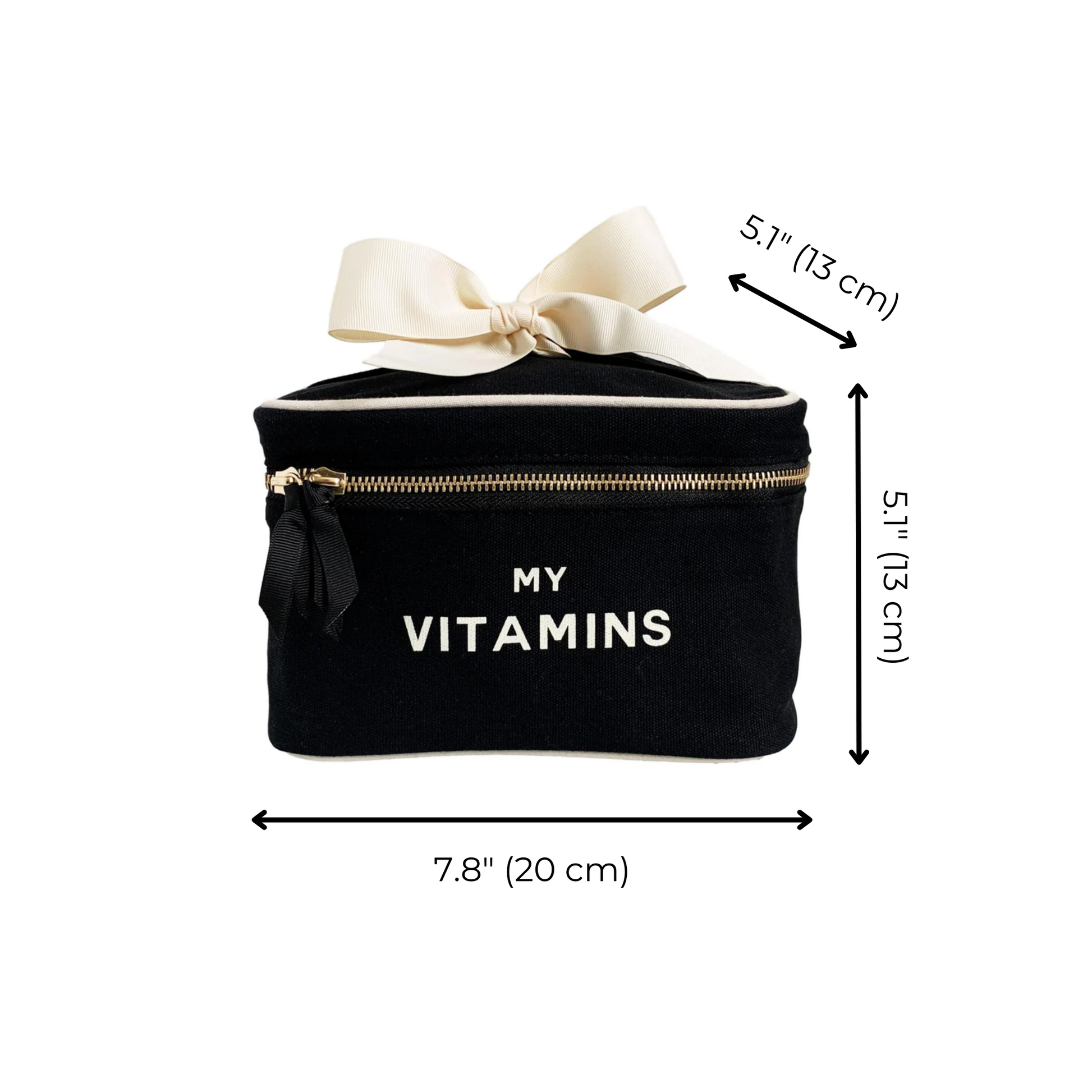 Bag-all Vitamins Storage and Travel Box in black canvas with cream bow, gold zipper, and "MY VITAMINS" text, showing dimensions 20x13x15cm