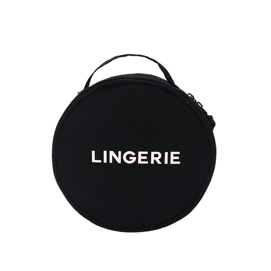 Bag-all Round Lingerie Case in black with white text, featuring top handle and dual zippers with recycled ribbon pulls, perfect for organizing delicates and travel