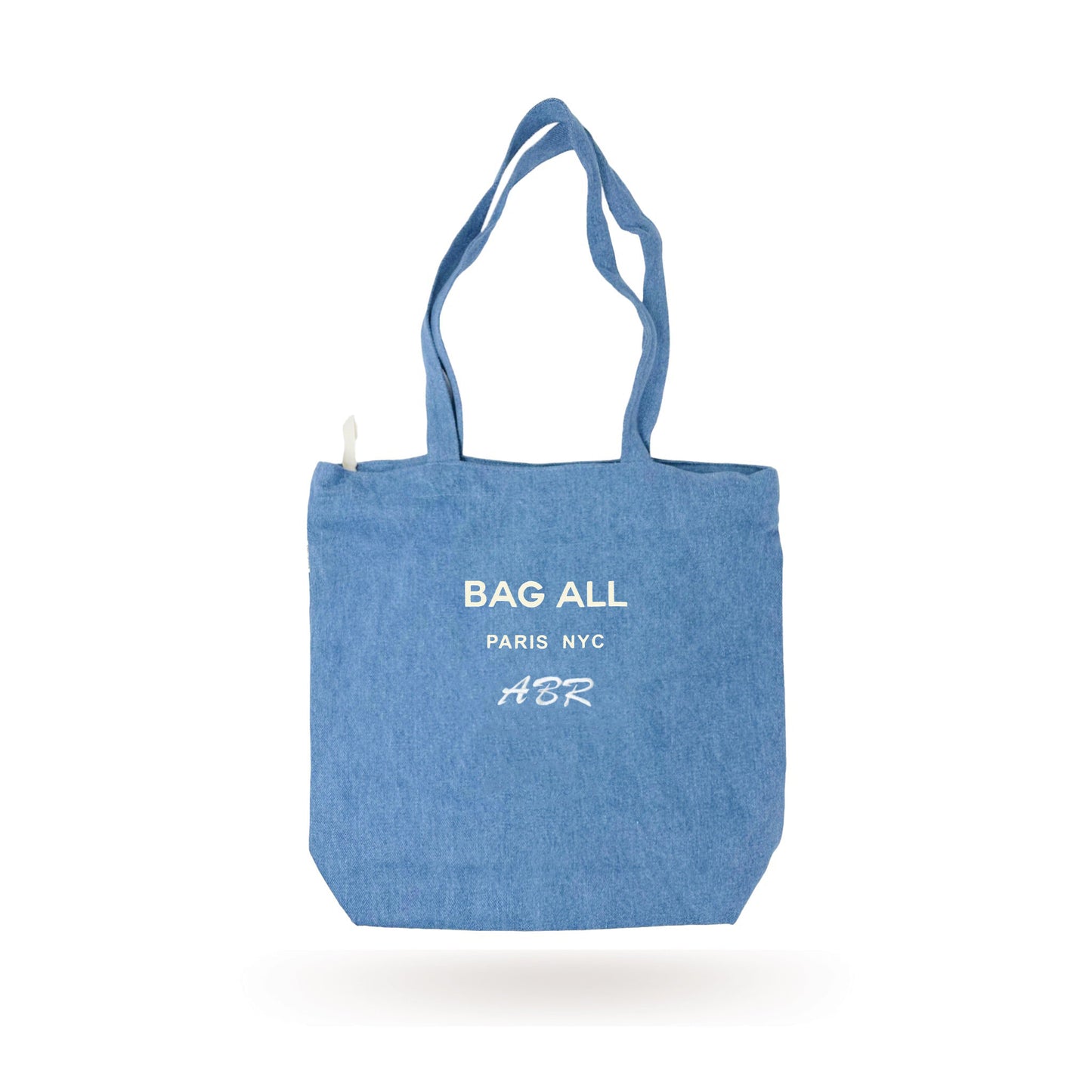 Bag-all Paris Le Marais denim tote with zipper, featuring white printed logo, inside pocket and long handles. Stylish everyday carry-all made from 100% denim with water-based eco-friendly print.