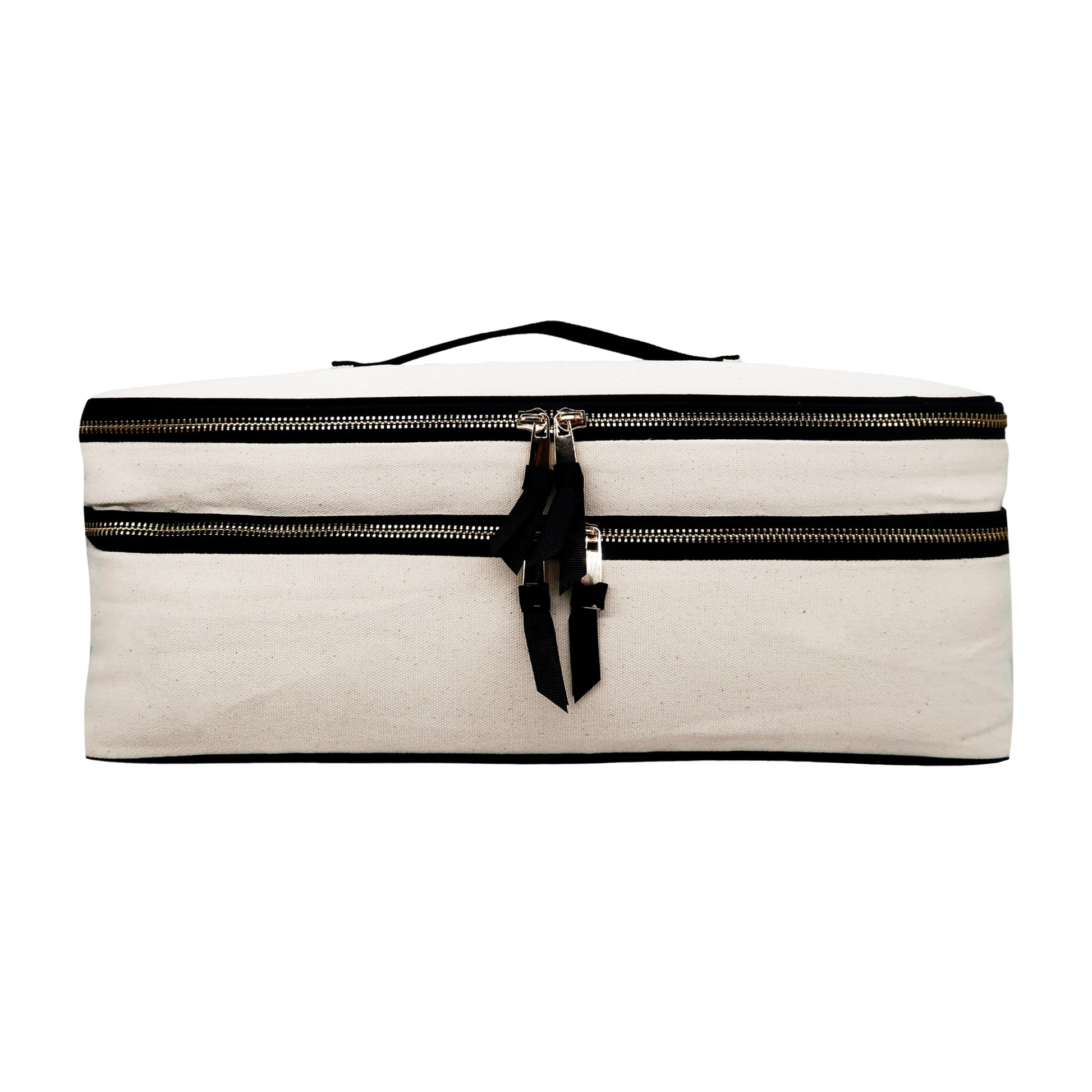 Bag-all Double Hair Tools Travel Case in cream canvas with black trim, featuring dual compartments with heat-protective lining and secure straps for styling tools