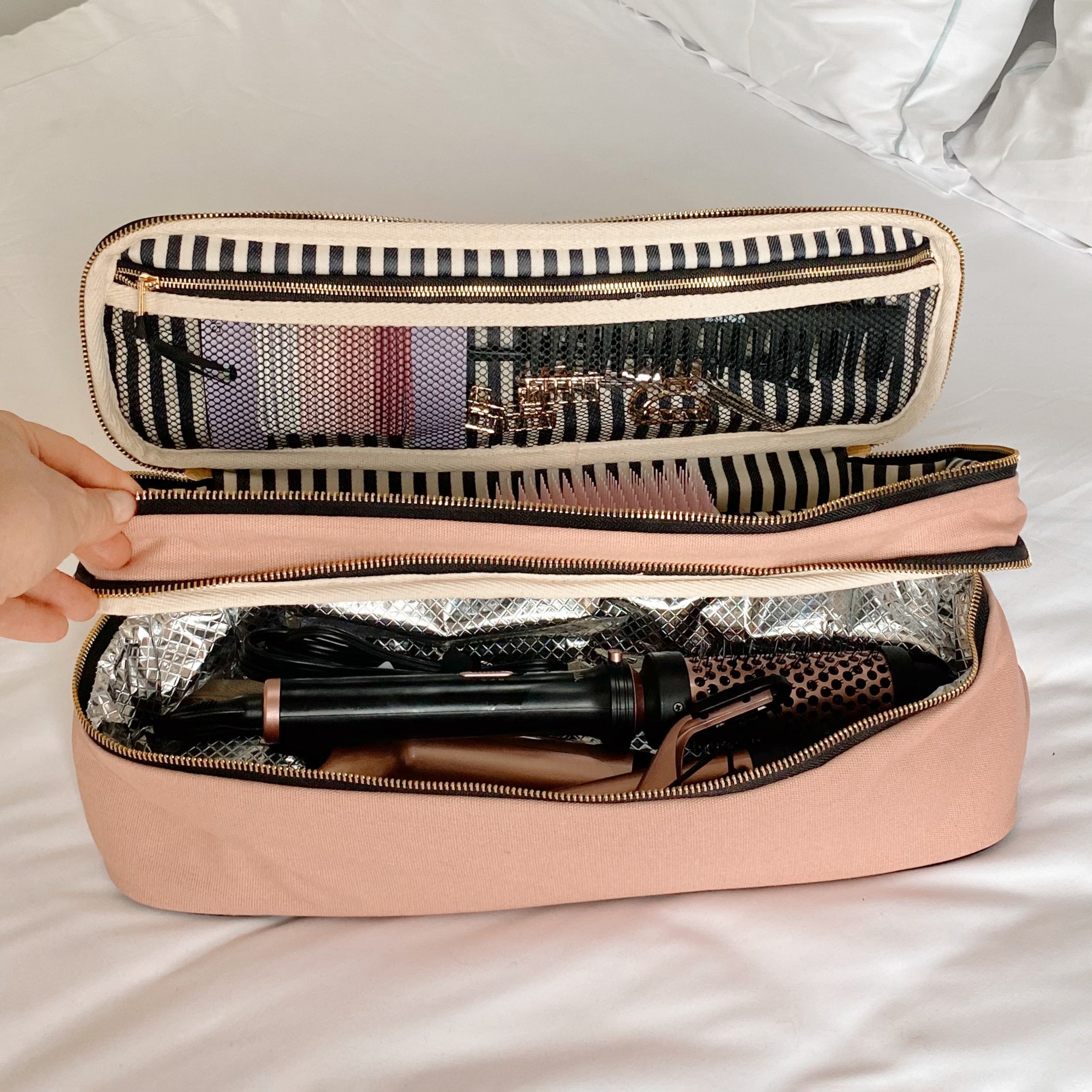 Bag-all Double Hair Tools Travel Case in Pink/Blush featuring heat-protective lining, dual compartments with secure bands, and mesh window for easy organization of styling tools and accessories