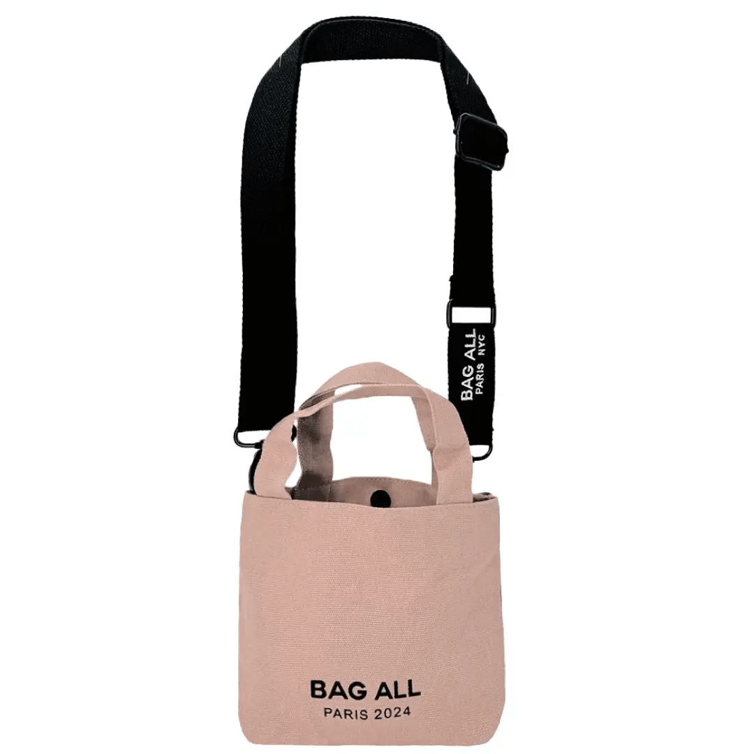 Bag-all Mini Tote Bag in pink/blush cotton with adjustable black strap, interior pocket and brand logo, perfect for everyday essentials and sustainable shopping