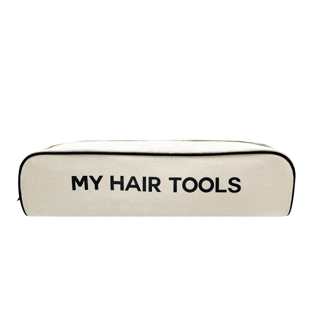 Bag-all Roomy Hair Wrap Tools Travel Case in cream cotton with heat-resistant lining, featuring black text 'MY HAIR TOOLS' and gold zipper detail