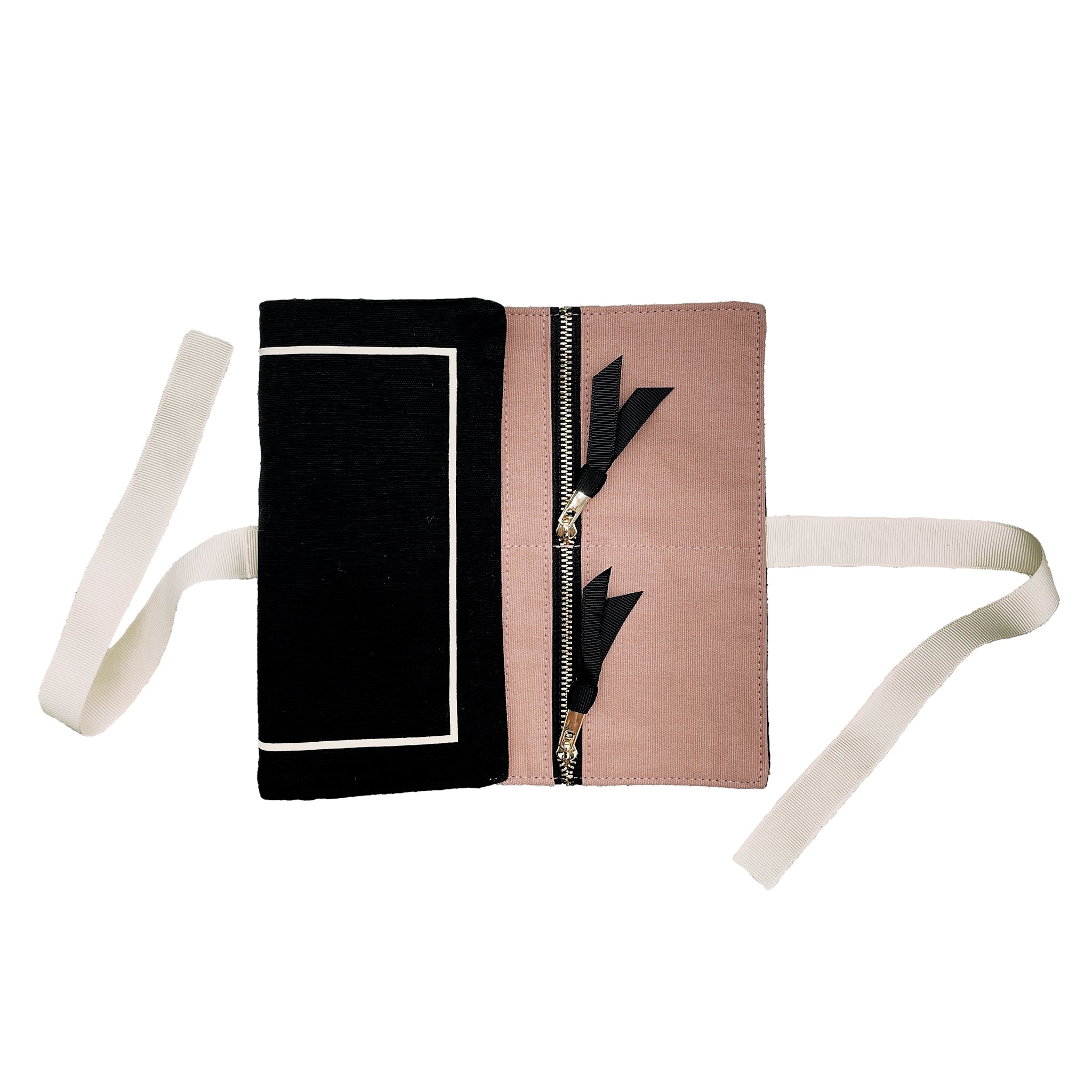 Bag-all Couture Jewelry Roll Medium Black, featuring pink interior lining, dual zipper compartments and white straps for secure jewelry storage and travel organization