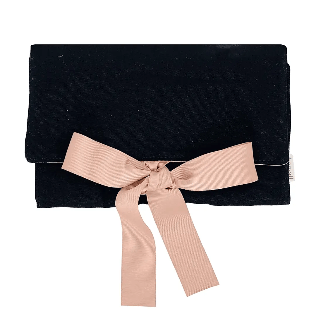 Bag-all Large Jewelry Roll in elegant black velvet with blush pink bow closure, perfect for organizing and protecting jewelry while traveling