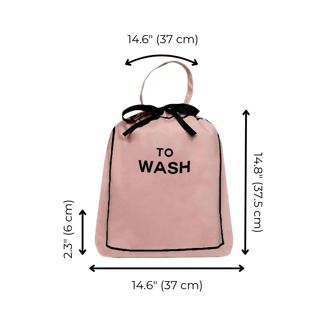 Bag-all To Wash Laundry Bag in pink blush cotton with black bow drawstring, featuring dimensions 14.6" x 14.8" and text TO WASH printed on front