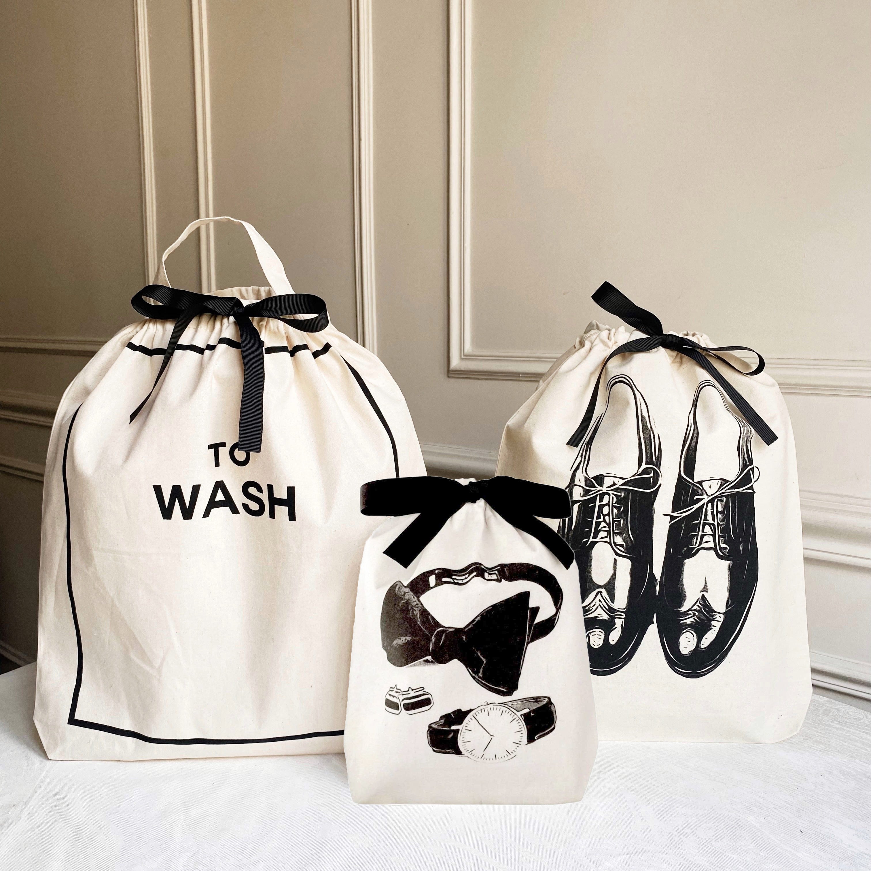 Bag-all Deal Gift Set His Favorites 3-pack with "To Wash" laundry bag, men's shoe bag, and accessories bag featuring black bow closures and elegant monochrome prints on natural cotton