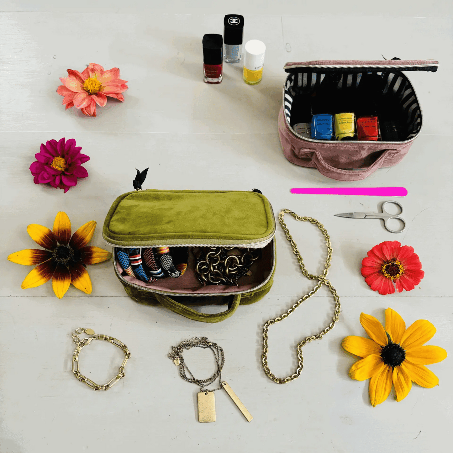 Bag-all Small Beauty Box in green velvet with nail polish, jewelry and colorful flowers, showing organized storage for cosmetics and accessories