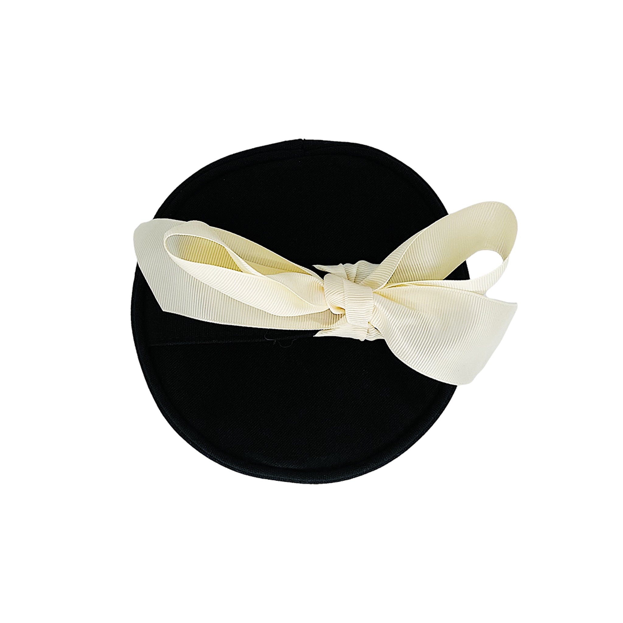 Bag-all Round Skin Care Case with Handle in Black featuring an elegant cream bow, cylindrical design for organized beauty storage