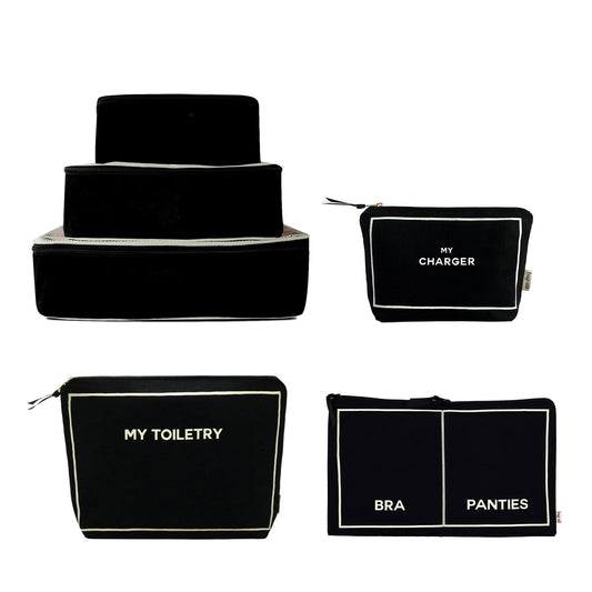 Bag-all Weekend Essential Packing Set 4-Pack in black with labeled pouches for organized travel and style
