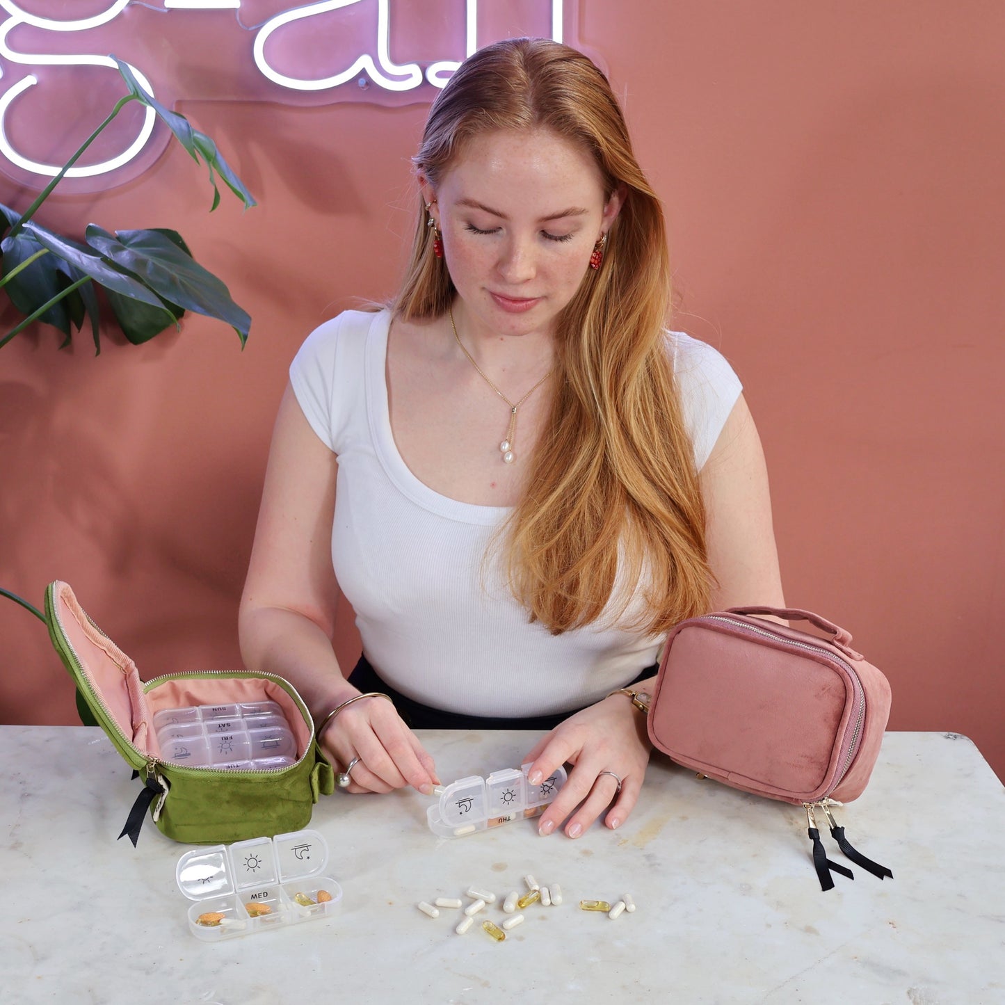 Bag-all Large Pill Box in Pink Eco Velvet with Daily Inserts, featuring compartments for organized medication storage