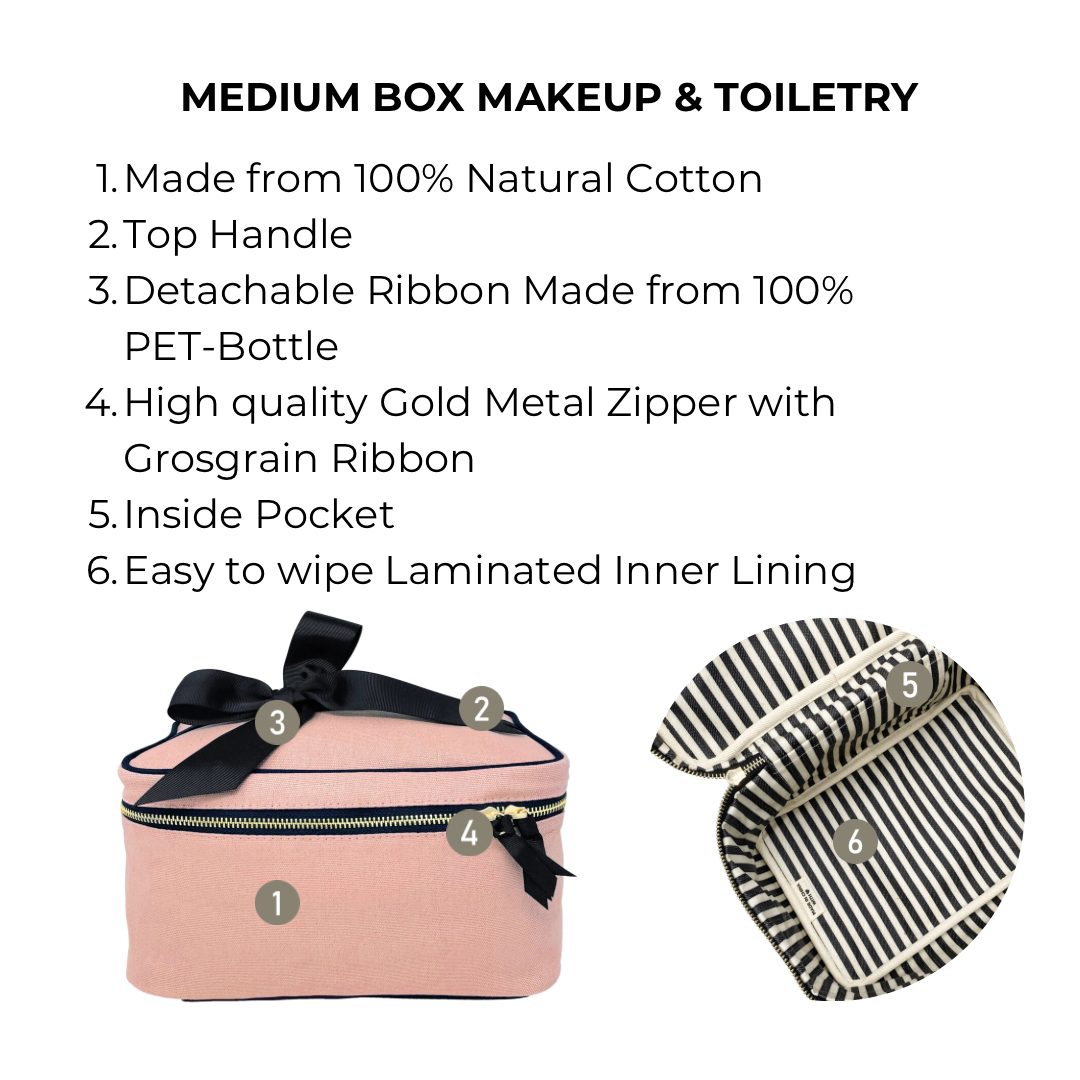 Bag-all Medium Box Makeup & Toiletry in blush pink with gold zipper, detachable bow handle, striped laminated interior lining, and inner pocket - perfect travel organizer