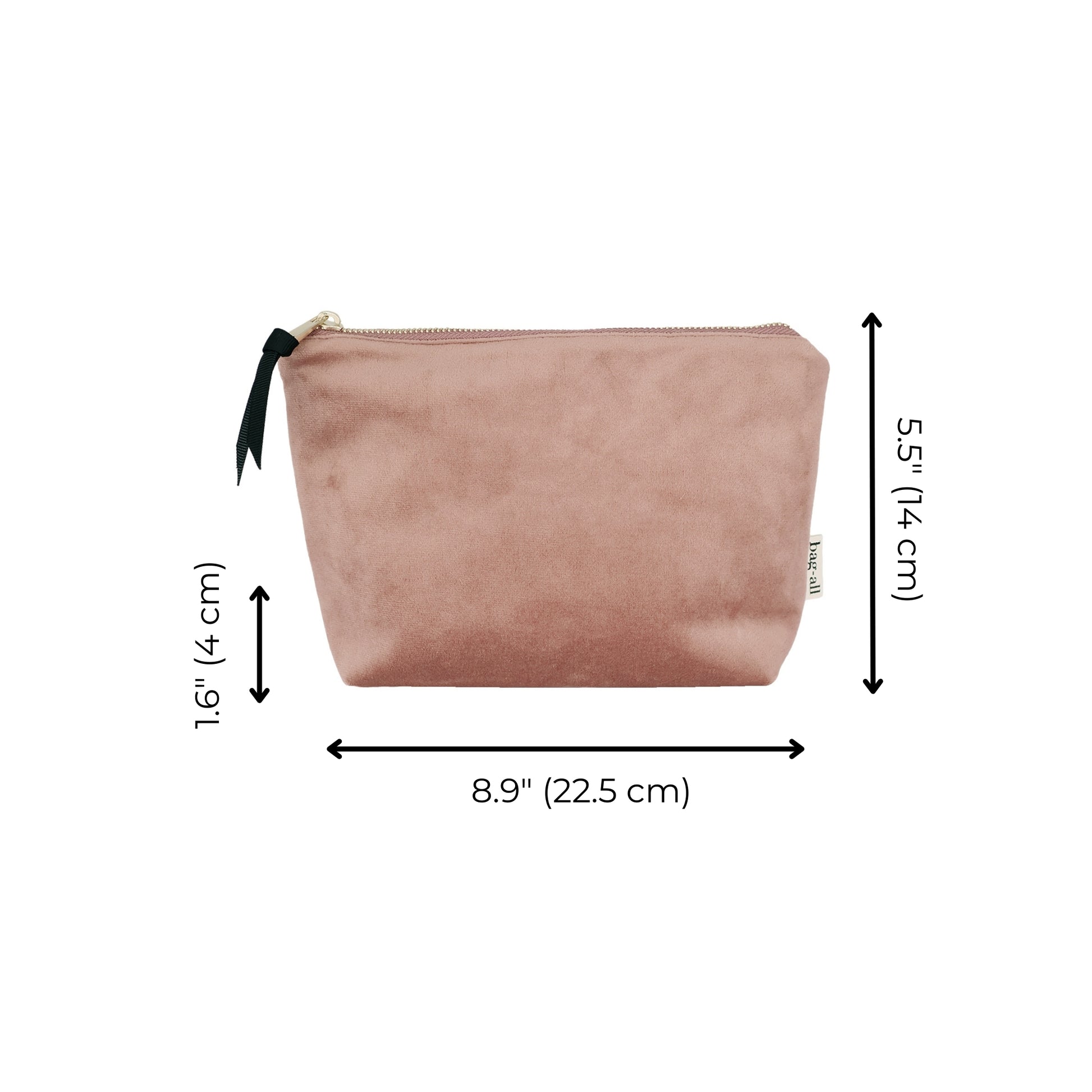 Bag-all My Makeup Pouch in pink velvet with waterproof coated lining, featuring gold zipper and black bow detail. Measures 8.9 x 5.5 inches, perfect for organizing beauty essentials.