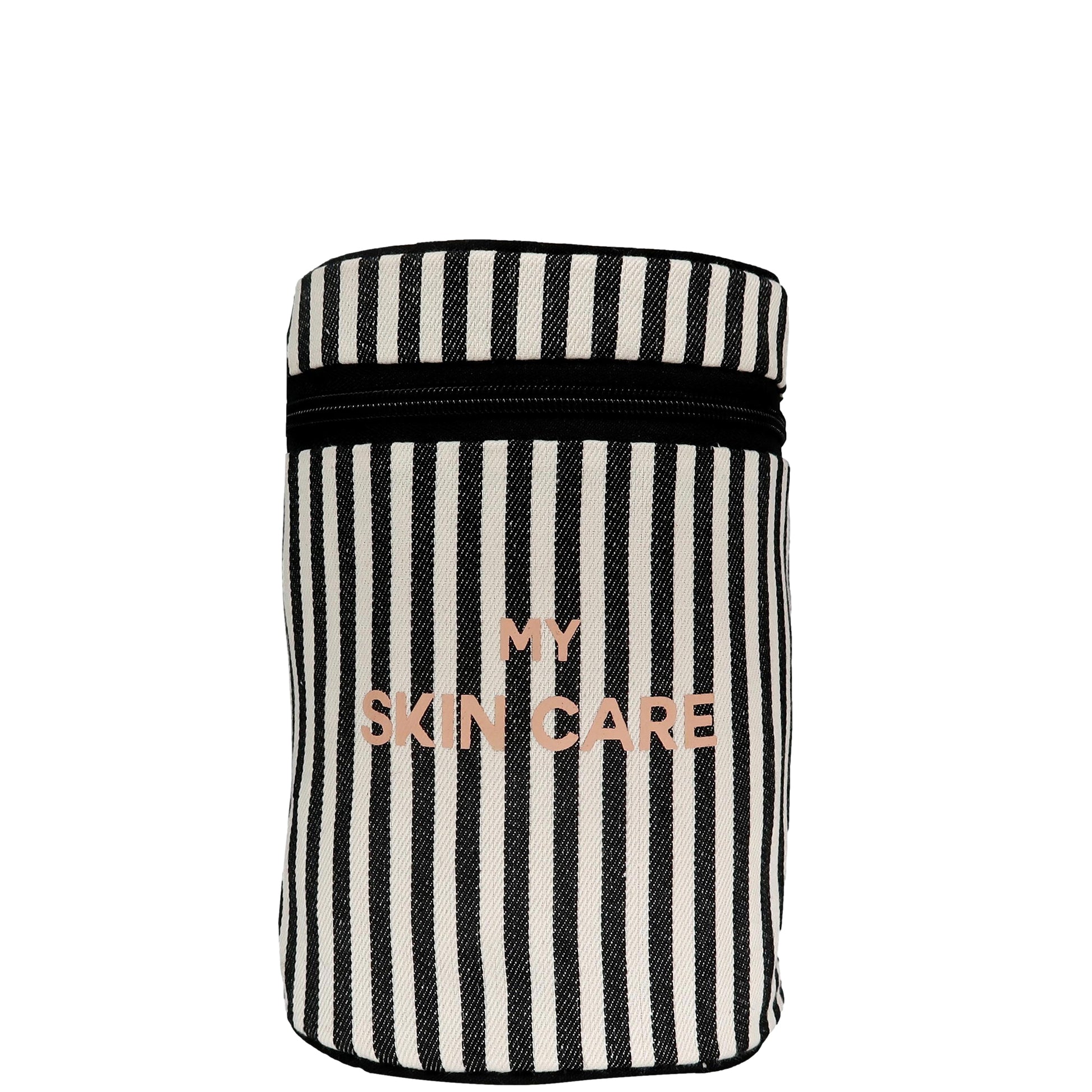 Bag-all Round My Skin Care Case with black and white stripes, rose gold lettering, cylindrical design, waterproof lining, perfect for organizing beauty products
