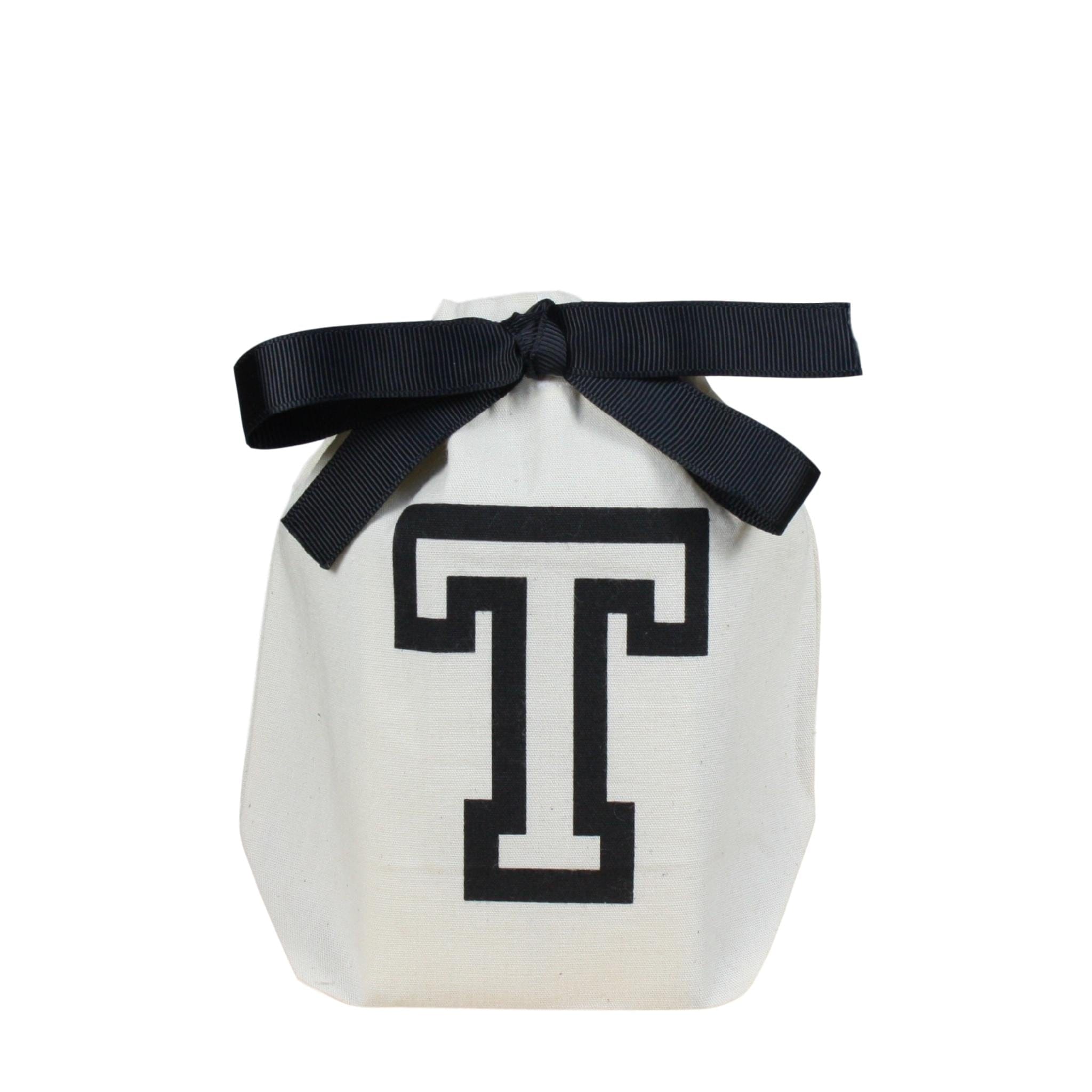 Small cream Bag-all Letter Bag with black T print and black ribbon tie for organizing small personal items