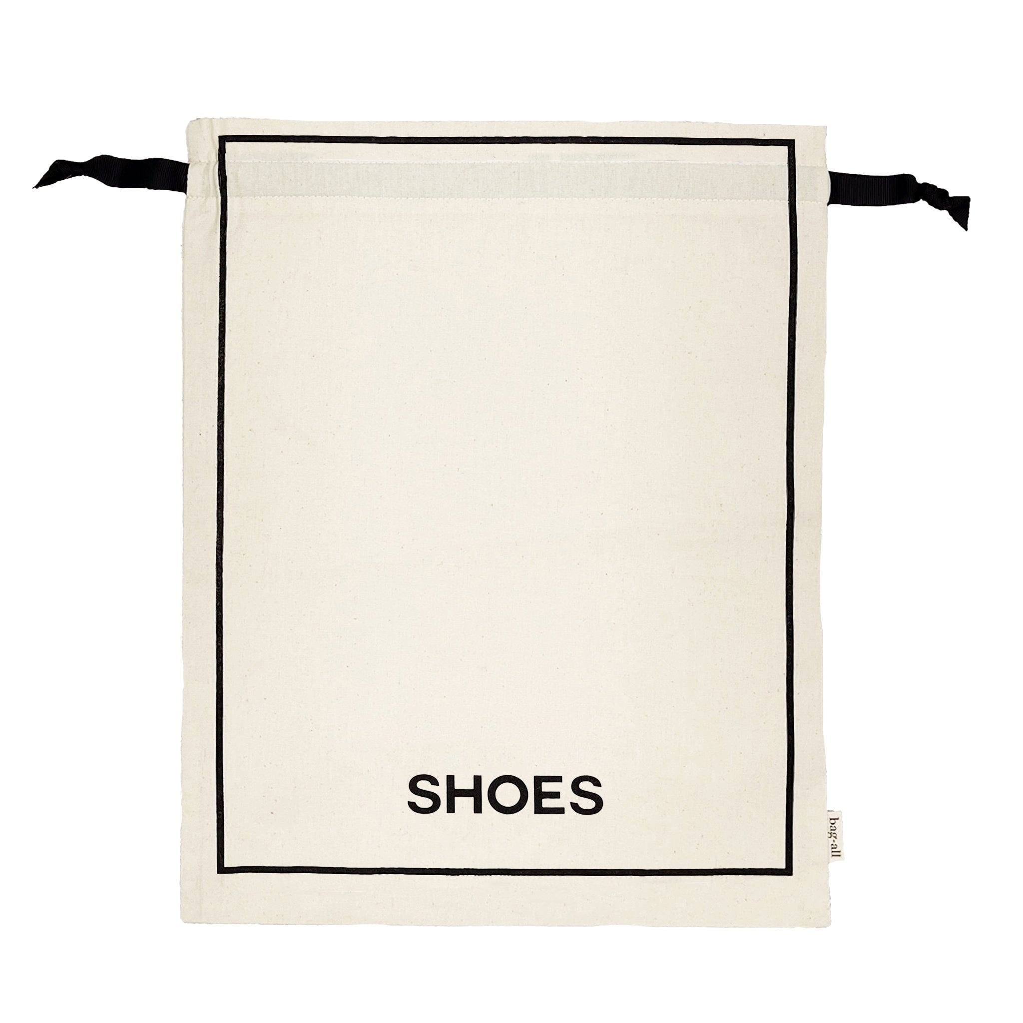 Bag-all Couture Shoe Travel Bag in cream cotton with black border and SHOES text print, featuring drawstring closure and eco-friendly water-based ink