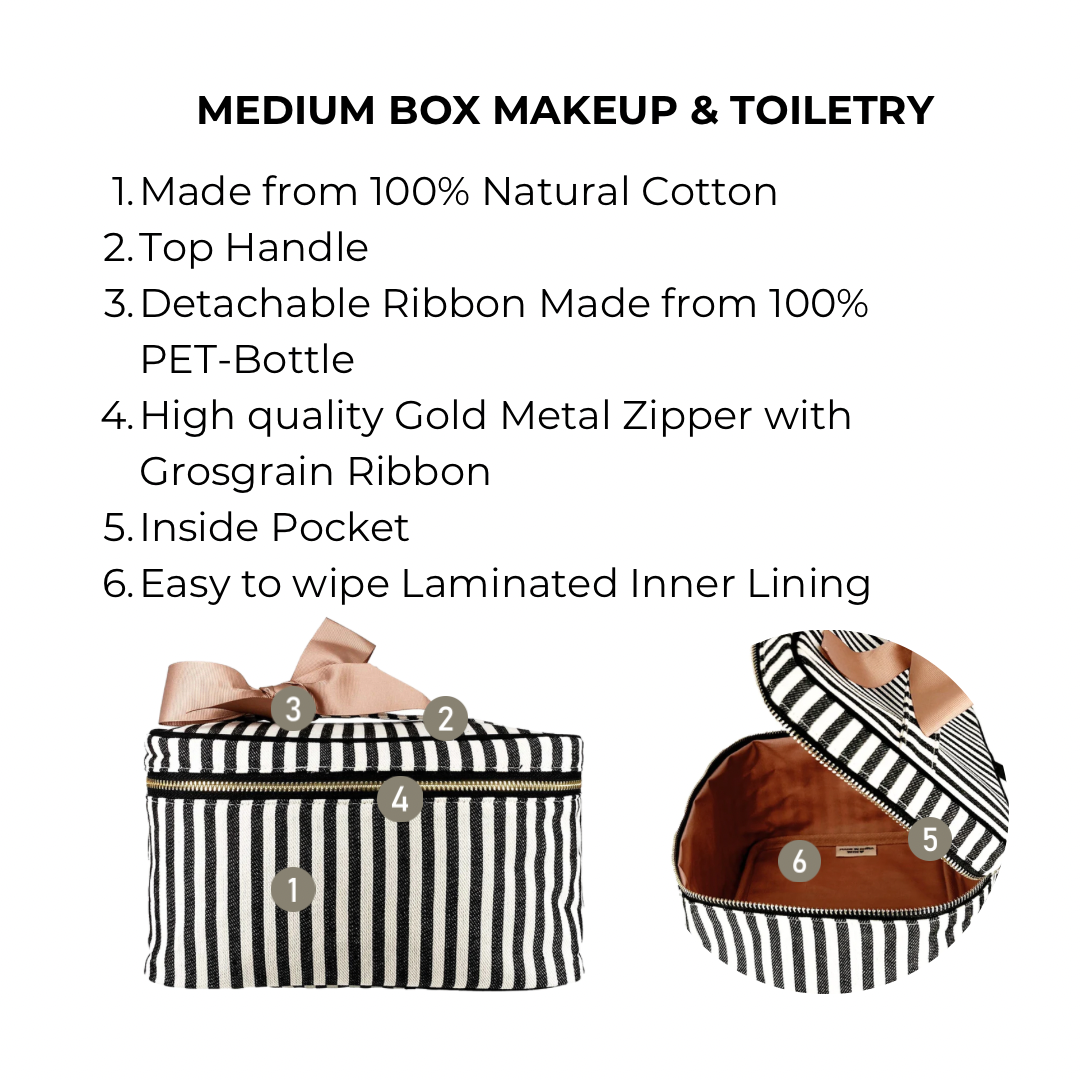 Bag-all Medium Box Makeup & Toiletry in black and white stripes featuring cotton construction, gold zipper, laminated interior, and recycled ribbon handle - perfect for organizing beauty essentials