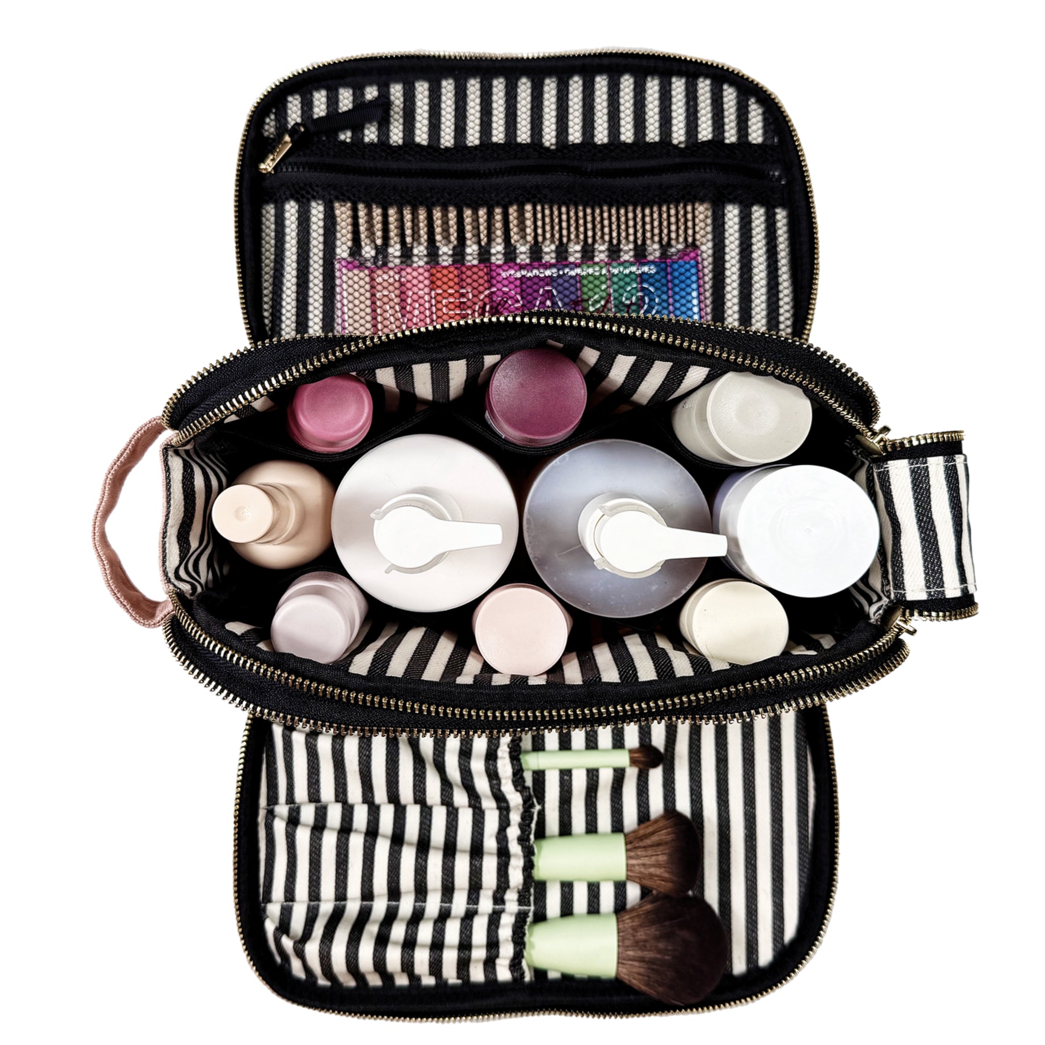 Bag-all Triple Beauty & Toiletry Organizer in pink blush with striped interior holding bottles and makeup brushes