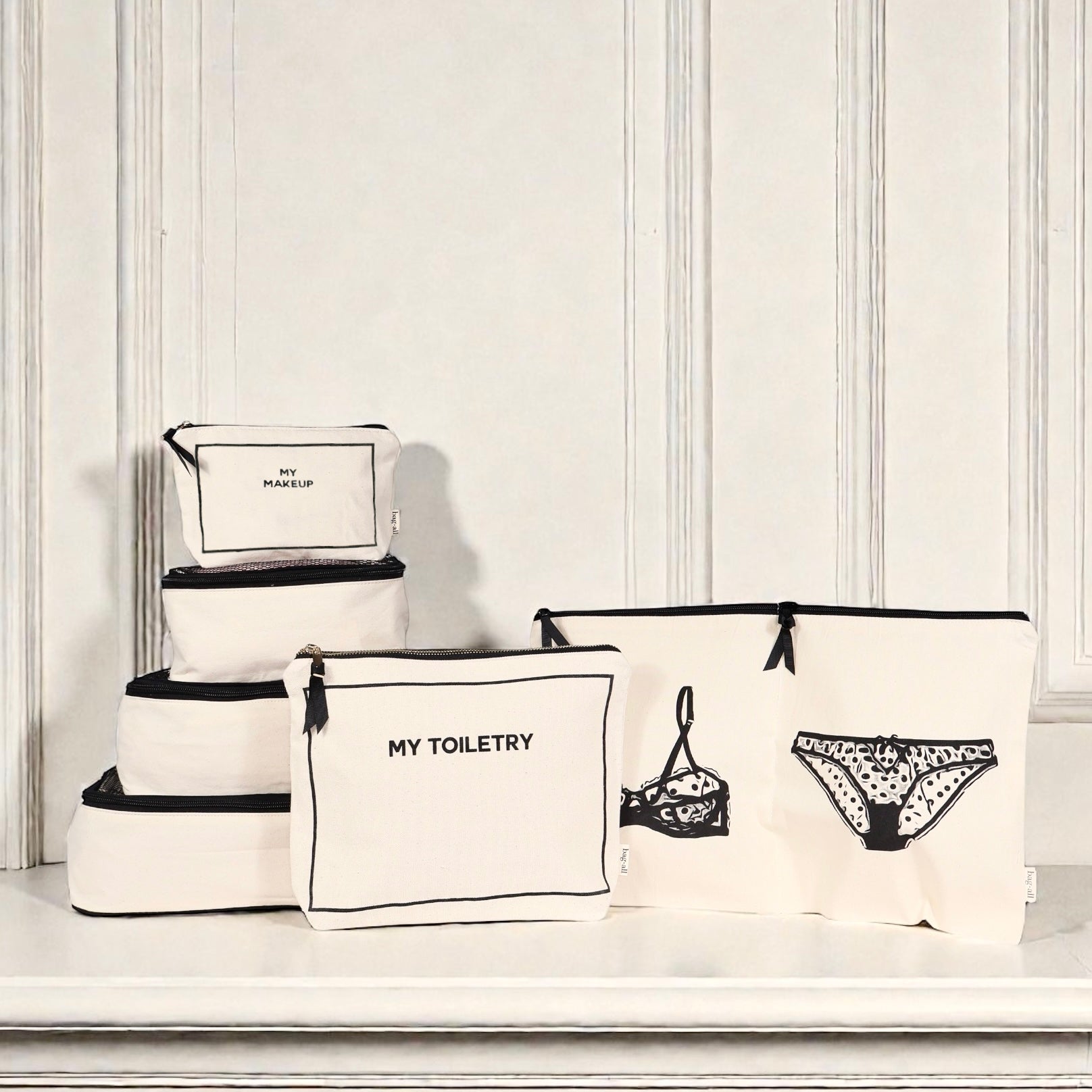 Cream Bag-all Weekend Essential Packing Set 4-pack with toiletry and makeup bags in gallery position one display