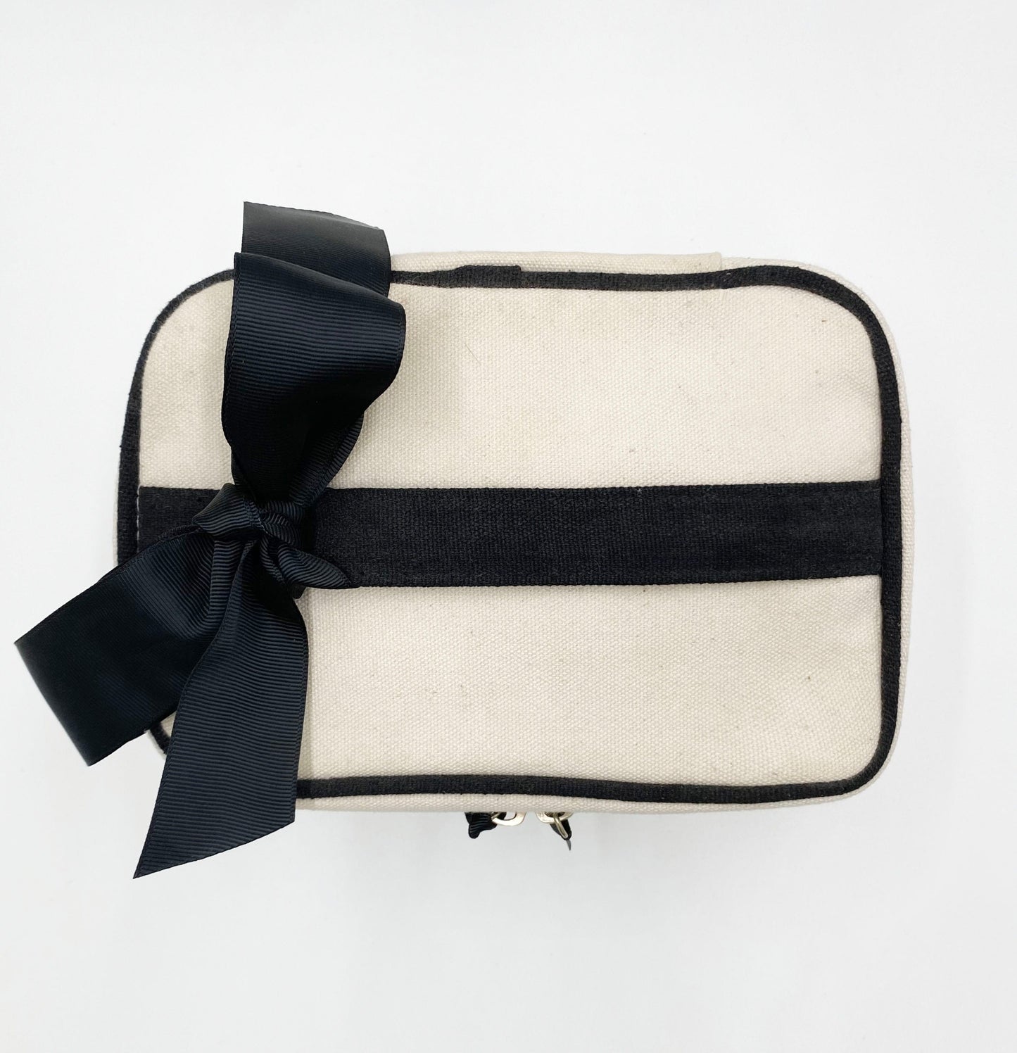 Bag-all Deal Gift Set 4-pack featuring cream cotton travel cases with black trim and bow, includes laundry bag, makeup box, hair case, and toothbrush holder for stylish organization