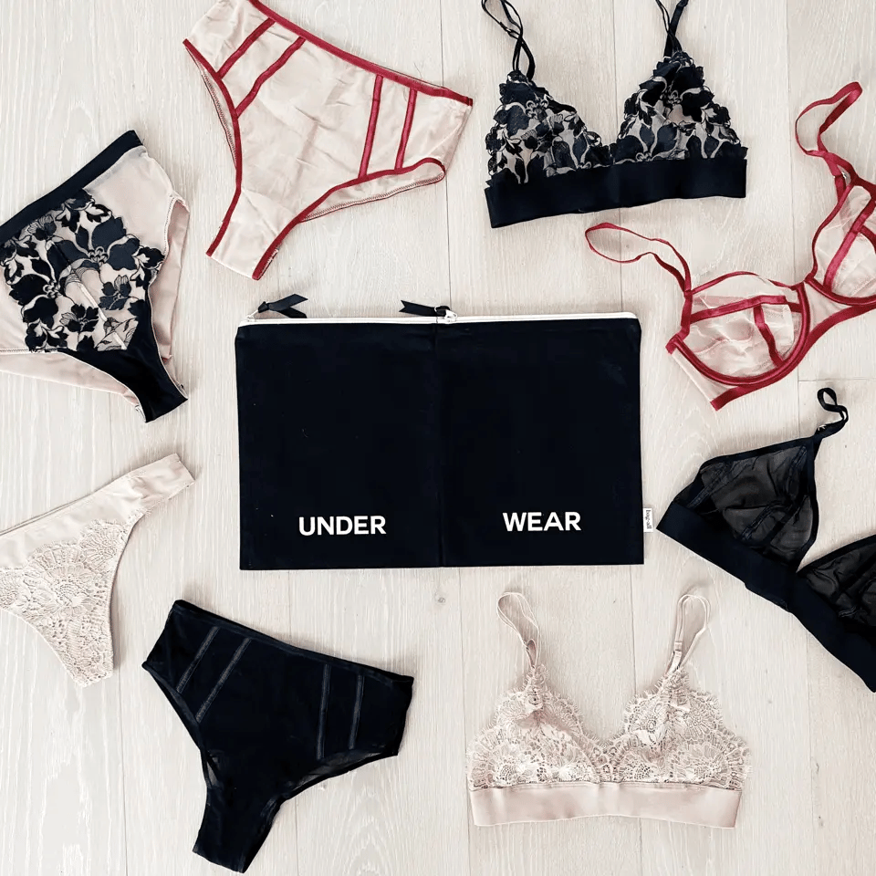 Bag-all Weekend Essential Packing Set featuring elegant lingerie pieces and black cotton underwear organizer pouch arranged on white surface, showcasing versatile travel organization