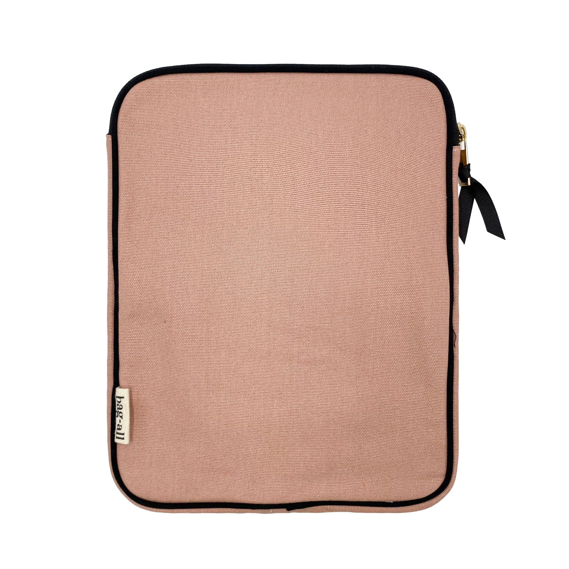 Bag-all Tablet Case 11" in blush pink cotton with black trim, featuring front charger pocket and padded protection, perfect for stylish device organization