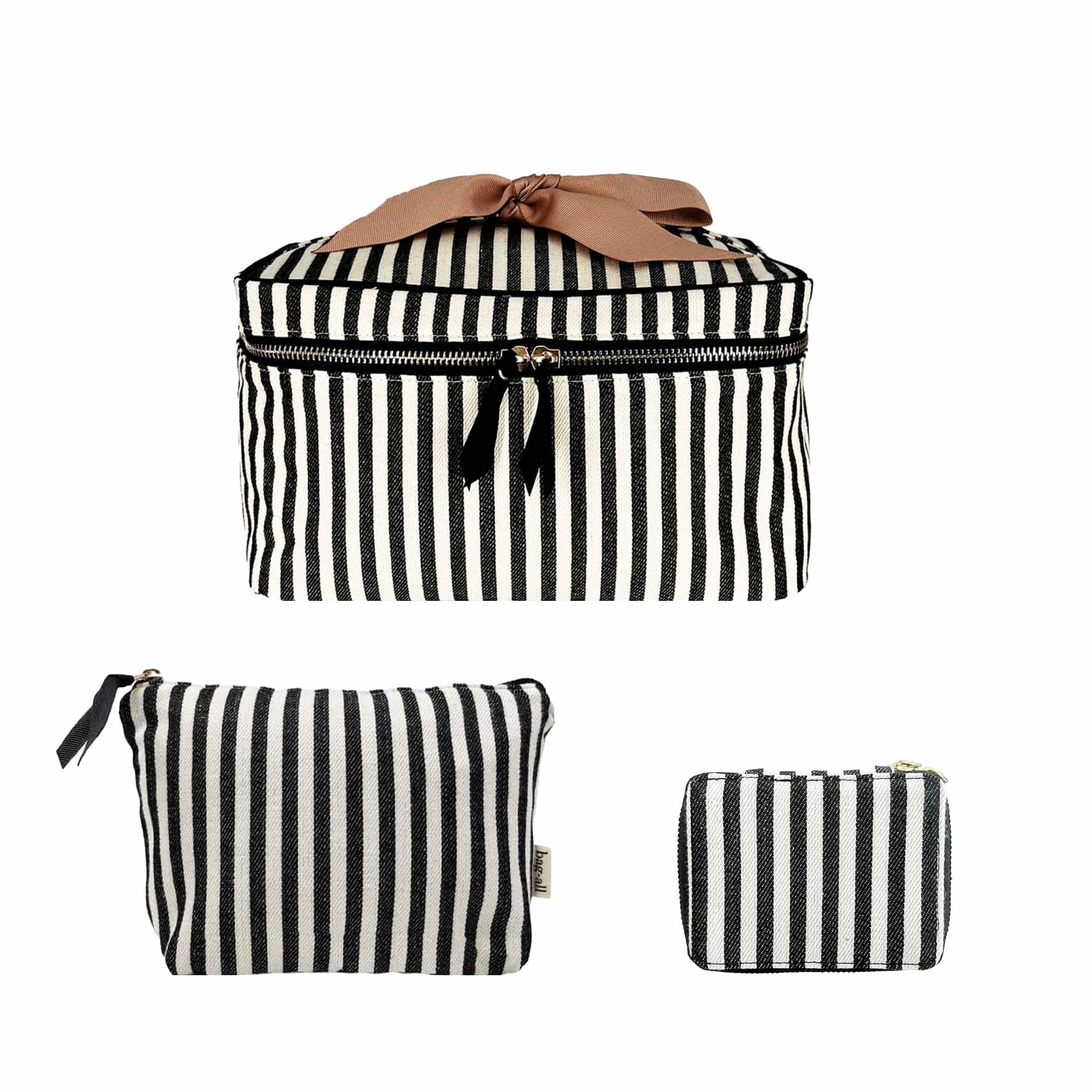 Bag-all Cutest Striped Travel Gift Set featuring black and white striped cotton toiletry bag, makeup pouch, and pill case with brown bow accent, perfect for stylish travel organization
