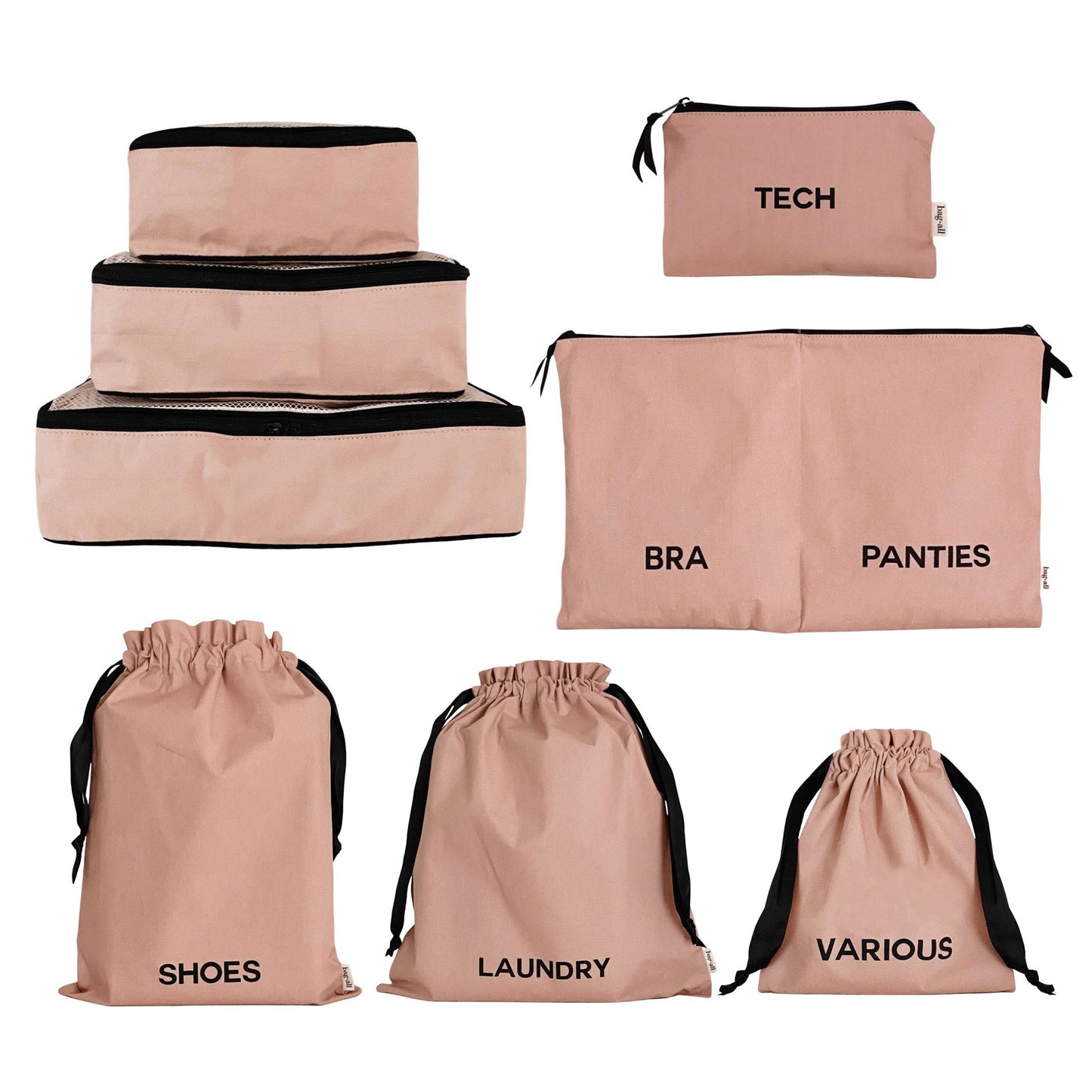 Bag-all pink travel organizer set featuring labeled pouches for tech, bra, panties, shoes, laundry and various items, plus three stacking cubes in blush cotton with black trim