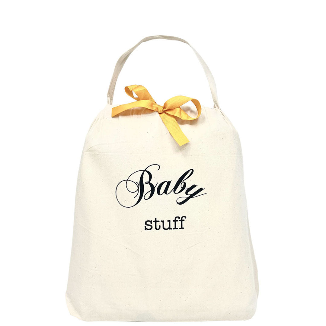 Bag-all cotton organizing bag with Baby Stuff text print and yellow bow, perfect for storing baby essentials and nursery organization