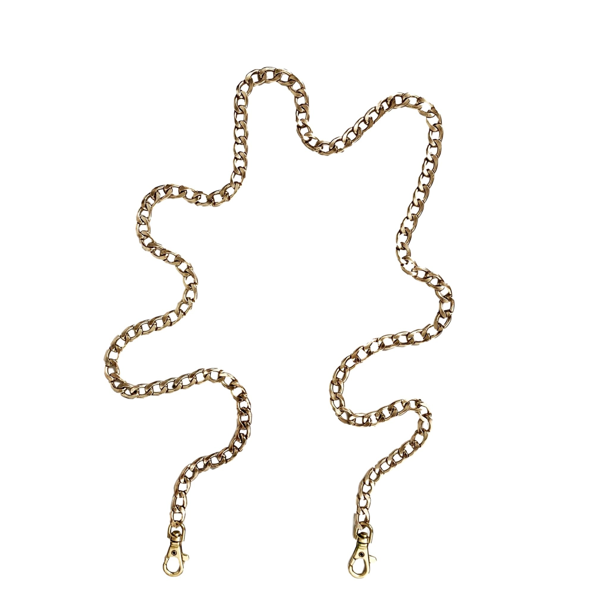 Bag-all Gold Chain strap with curved design and brass-toned metal links, featuring detachable clasps for versatile computer case styling