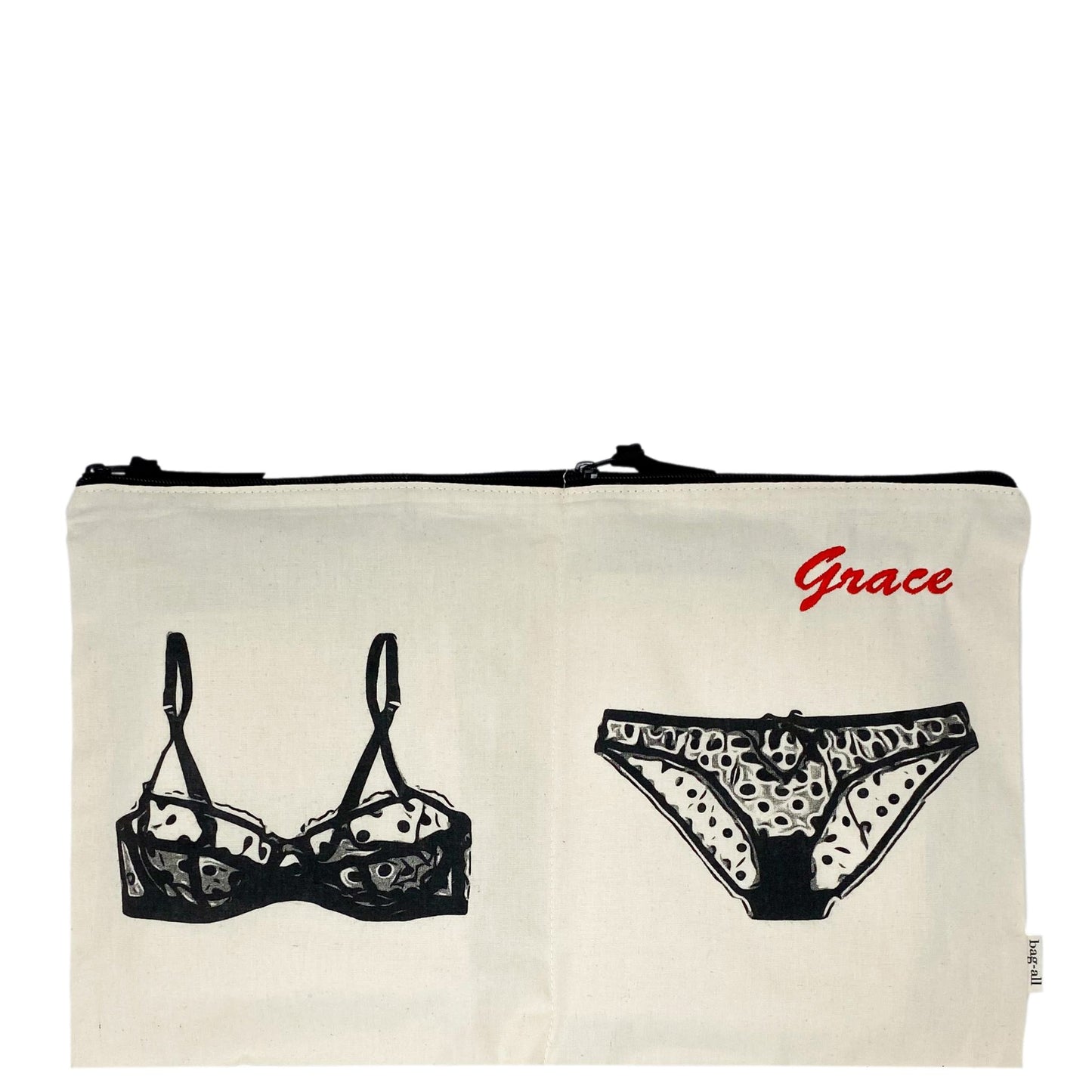 Bag-all Double Lingerie Packing Pouch in cream cotton with black illustrated bra and panty design, featuring personalized 'Grace' embroidery and dual zippered compartments