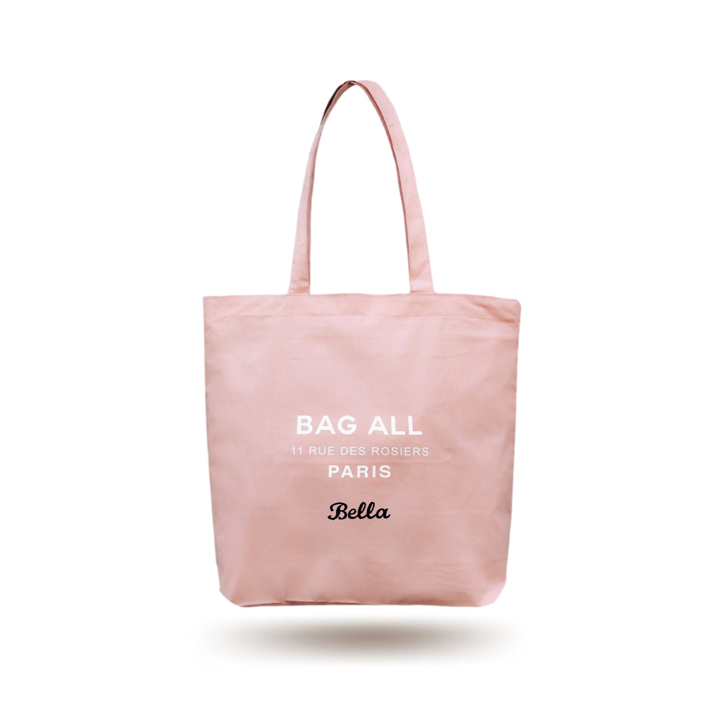 Bag-all Paris Le Marais pink cotton tote bag with zipper and inside pocket, featuring white logo print and customizable name monogram on blush fabric