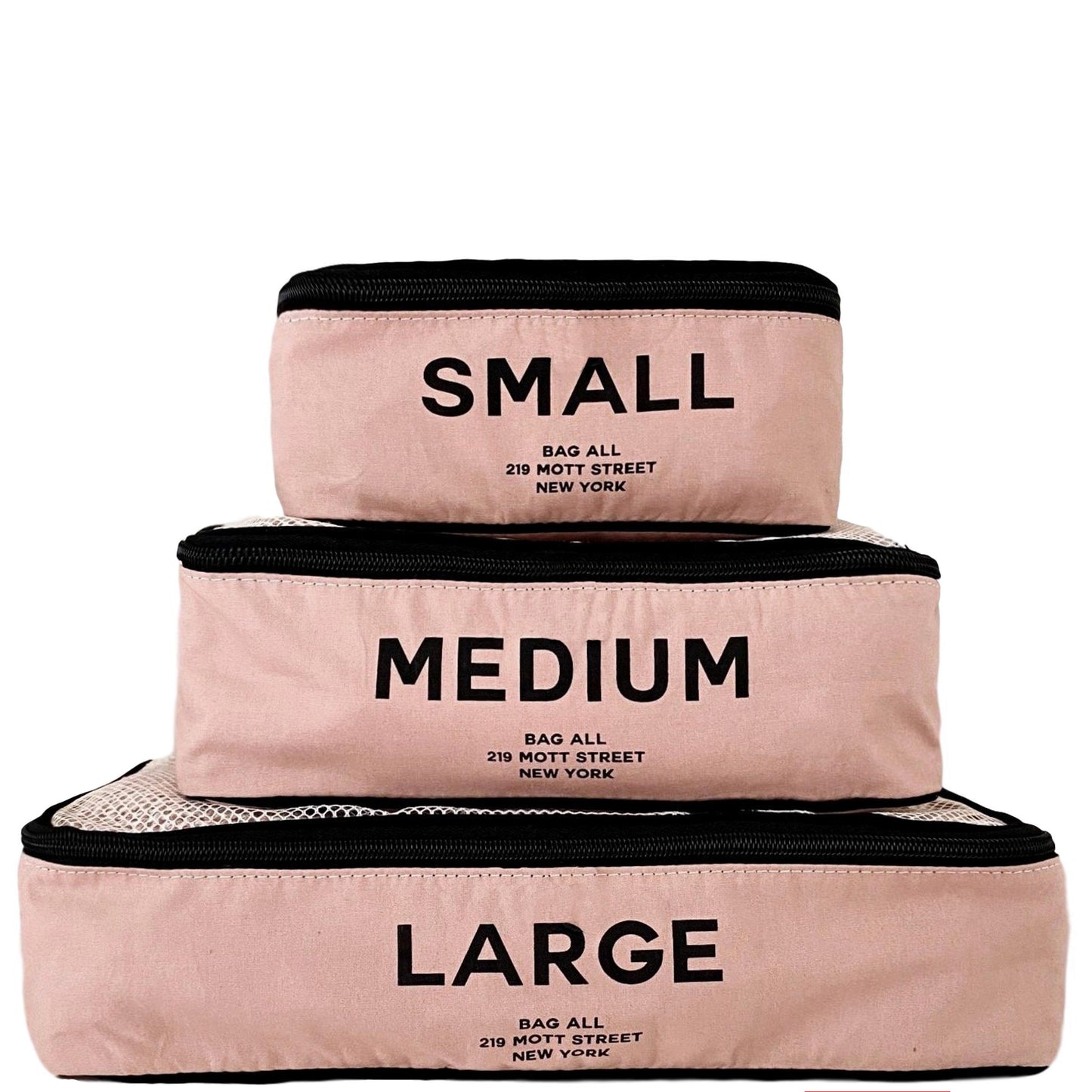 Bag-all Cotton Packing Cubes in Pink/Blush - Set of 3 sizes with mesh tops for organized travel and storage. Black text on pink fabric shows Small, Medium, Large labeling.
