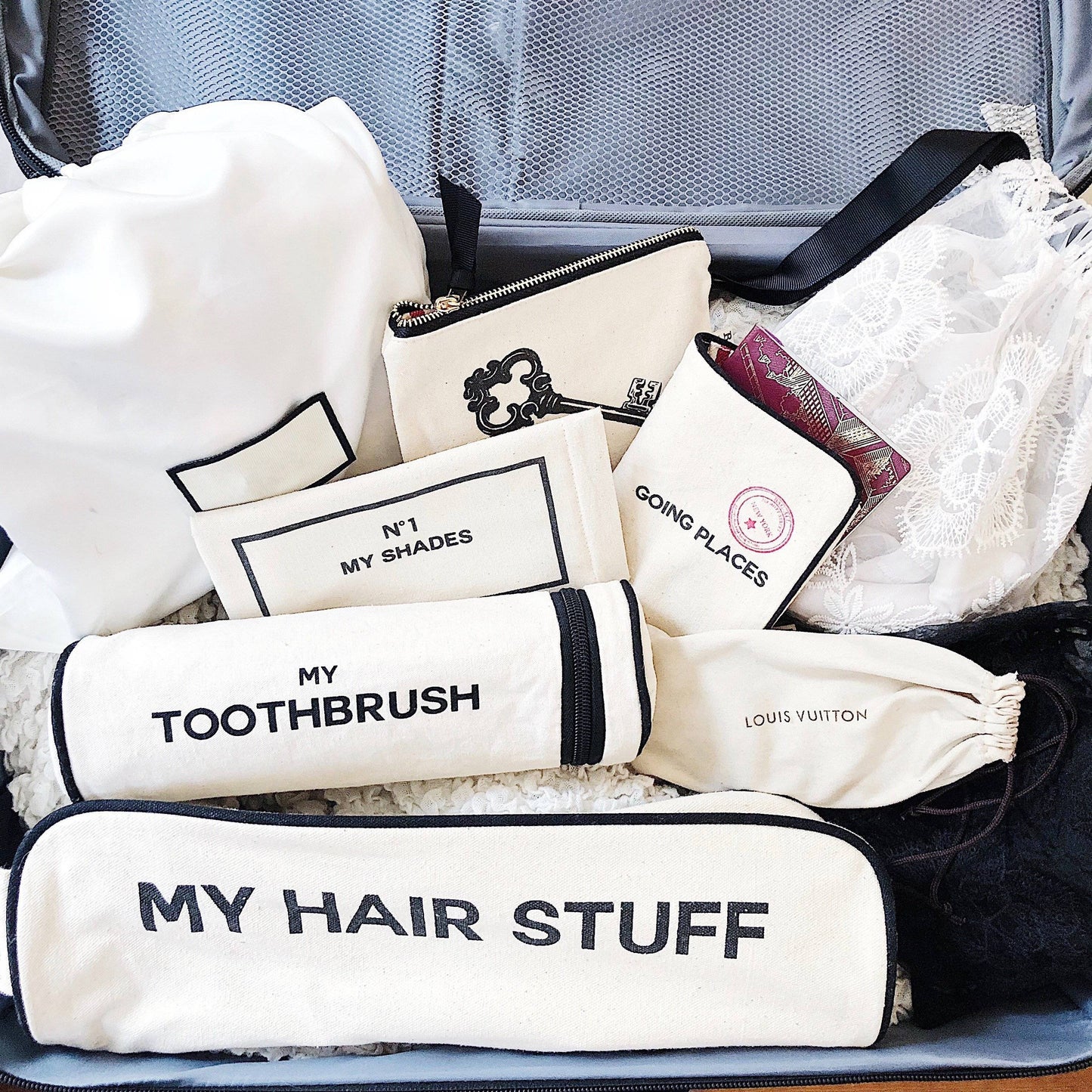 Bag-all Hair Stuff Travel Case in cream - stylish cotton organizer with durable metal zippers for storing hair tools and accessories, perfect for home and travel organization