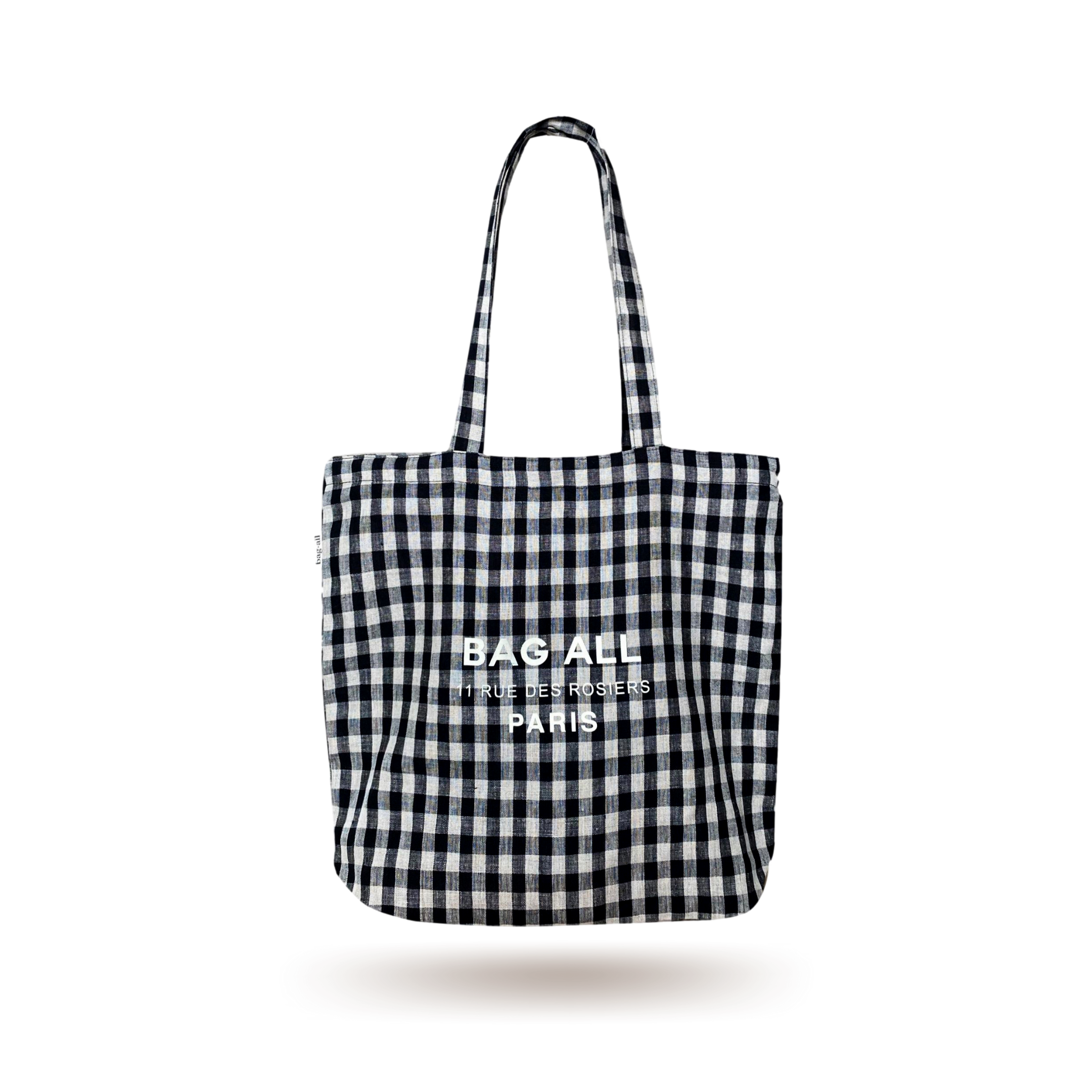 Bag-all Paris Le Marais black and white gingham tote bag with zipper and inner pocket, featuring long shoulder straps and linen construction for everyday carry