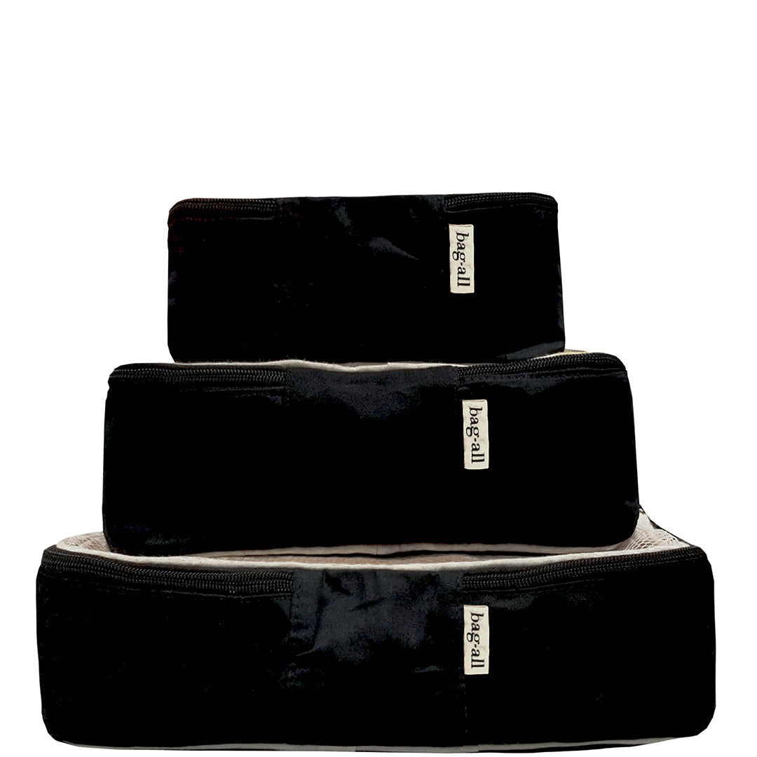 Bag-all Cotton Packing Cubes 3-pack in Black, featuring mesh-top organizers in small, medium, and large sizes for efficient travel and closet organization