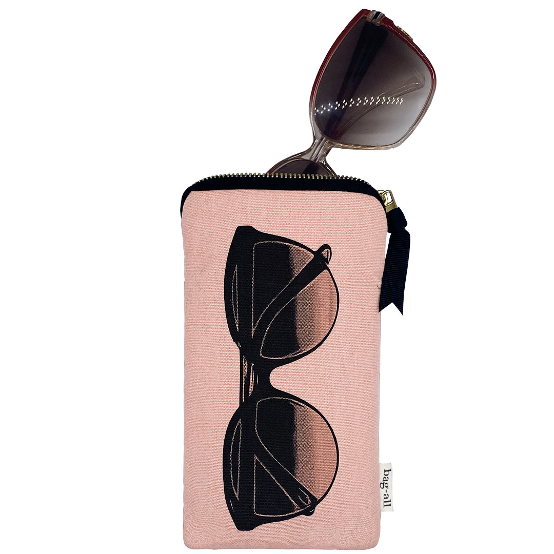 Bag-all Pink Glasses Case with Outside Pocket featuring sunglasses print, gold zipper, and extra storage compartment. Stylish blush pink protective case for eyewear display and storage.