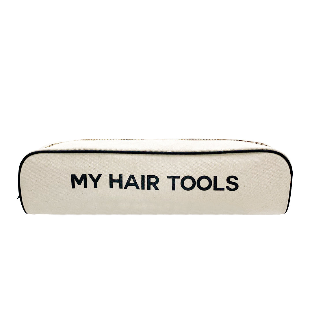Bag-all Roomy Hair Tools Travel Case in cream cotton with black text and gold zipper, designed for Airwrap and styling tools storage and travel