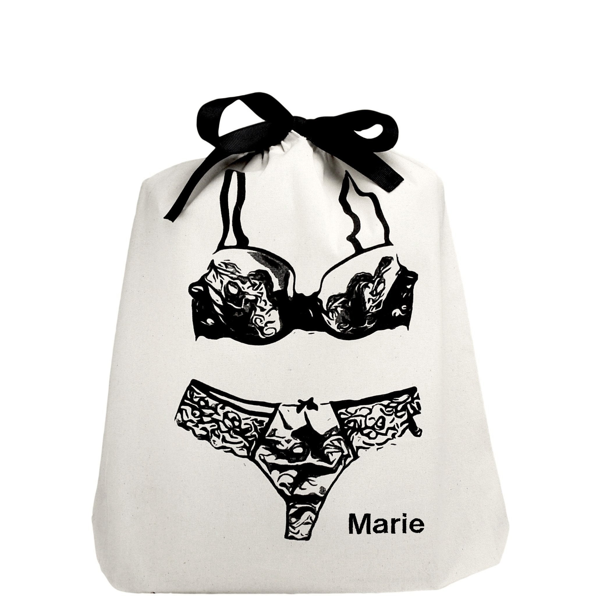 Bag-all Cream Lace Lingerie Travel Bag featuring black illustrated lingerie set design with elegant bow closure, perfect for organized travel and storage