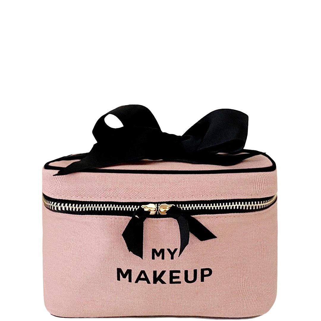 Bag-all My Makeup Cosmetic Box in blush pink with black bow, gold zipper and text, perfect for organizing beauty essentials, featuring laminated interior and carrying handle