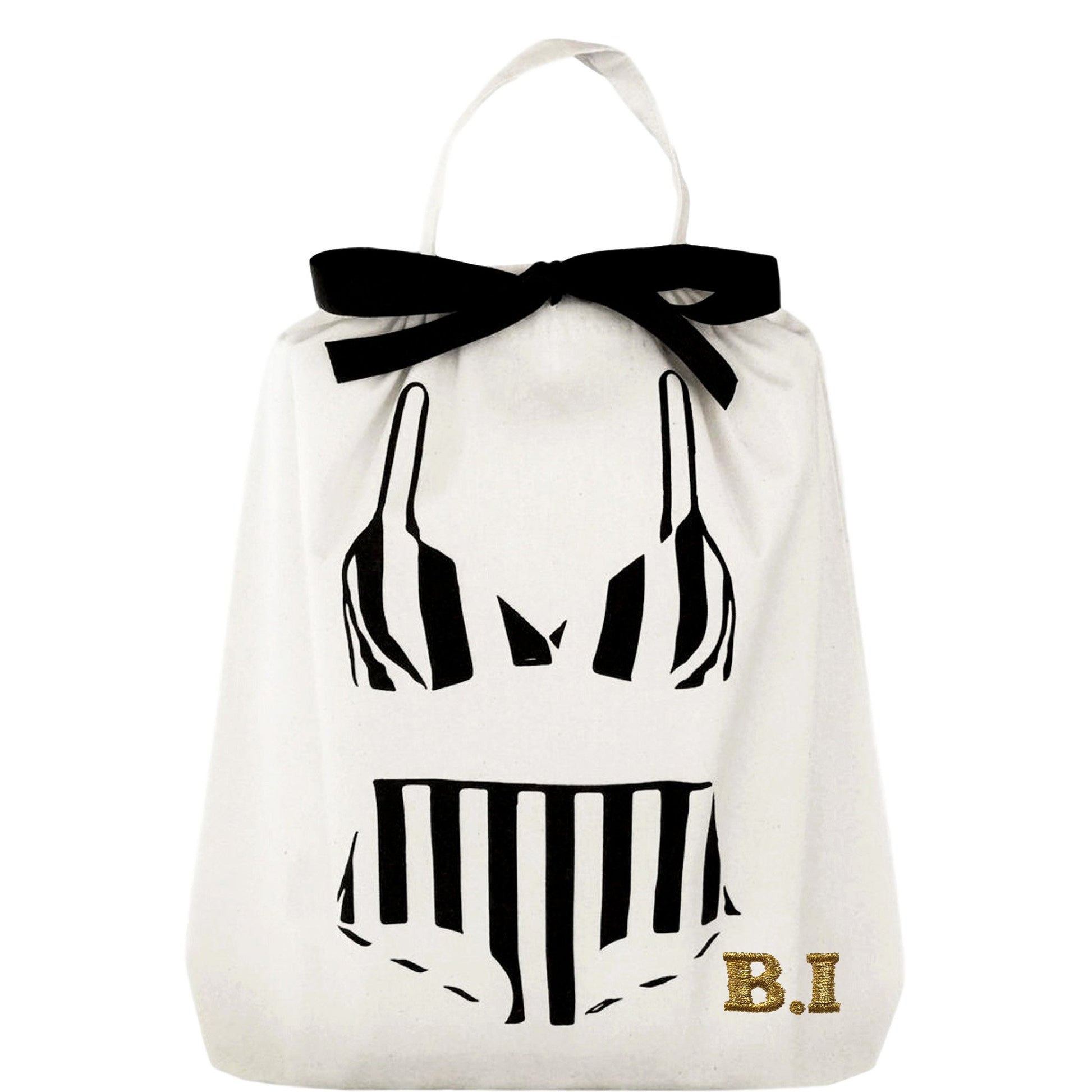 Bag-all white cotton organizing bag with black retro swimsuit print and gold monogram, featuring black bow detail and drawstring closure