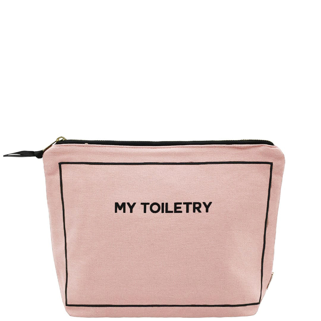 Bag-all Toiletry Pouch with Coated Lining in blush pink cotton, featuring waterproof interior, black trim details, and metal zipper for travel organization