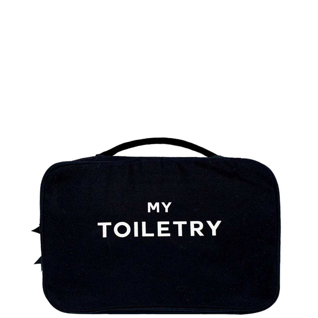 Bag-all Folding Hanging Toiletry Case in black cotton with MY TOILETRY text in white, featuring three compartments and hanging ribbon for travel organization