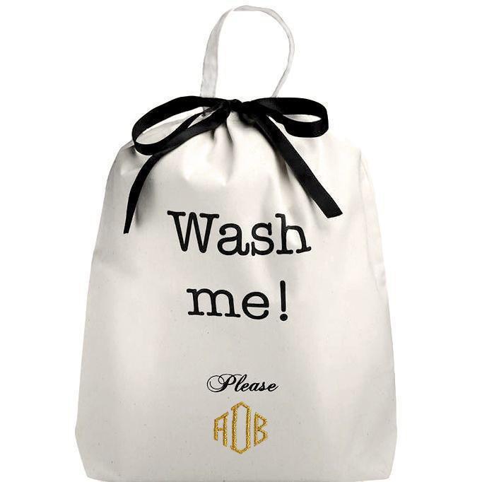 Bag-all Deal Gift Set featuring white cotton laundry bag with 'Wash me Please' text, black ribbon tie, and gold monogram, part of Her Favorites 3-pack Cream collection