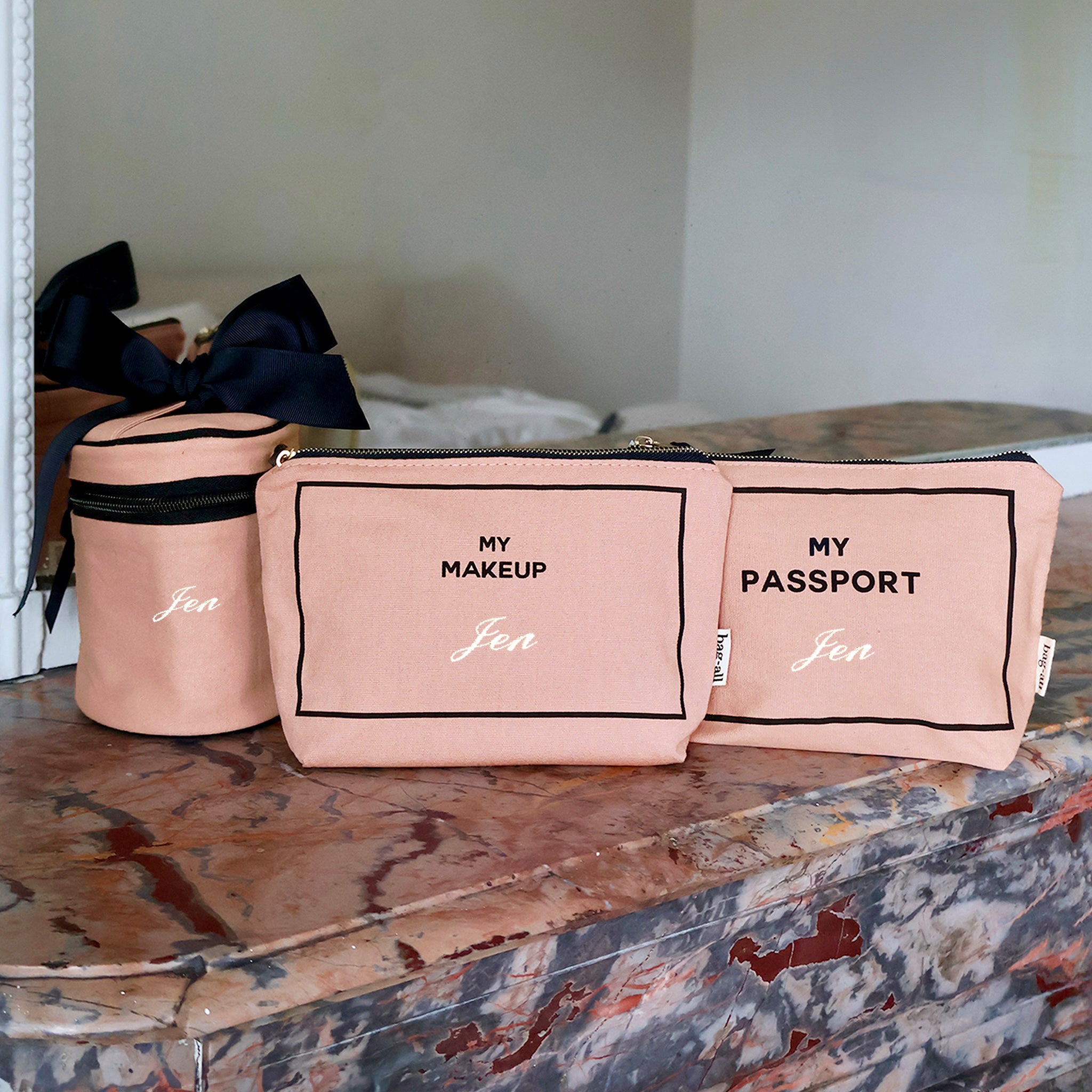 Bag-all pink blush 3-pack carry on essentials set with makeup, passport, and liquid organizers personalized with Jen text